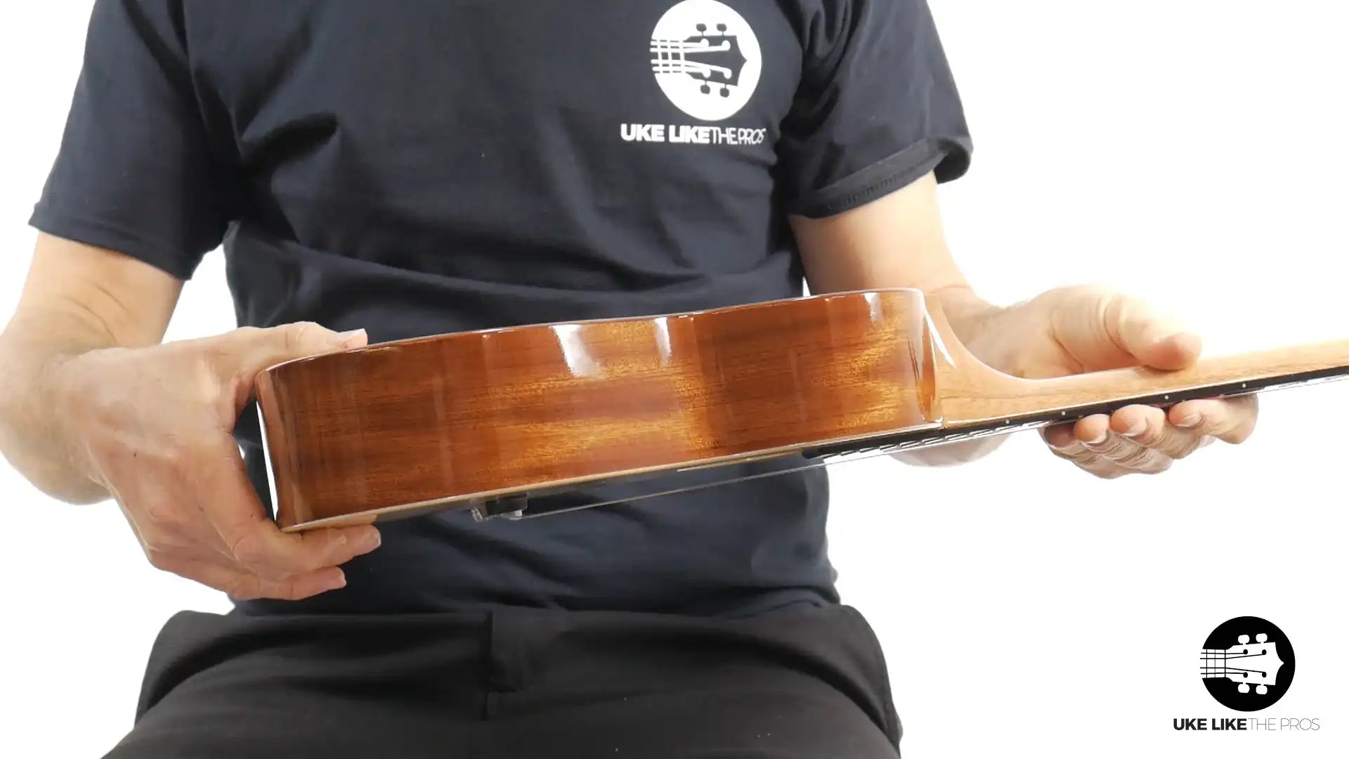 Side view of Rebel tenor ukulele with double wood binding at Terry Carter Music Store