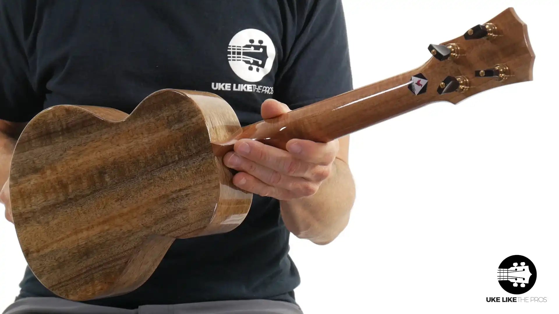 Rebel Double Creme ukulele with figured wood back and headstock, available at Terry Carter Music Store.