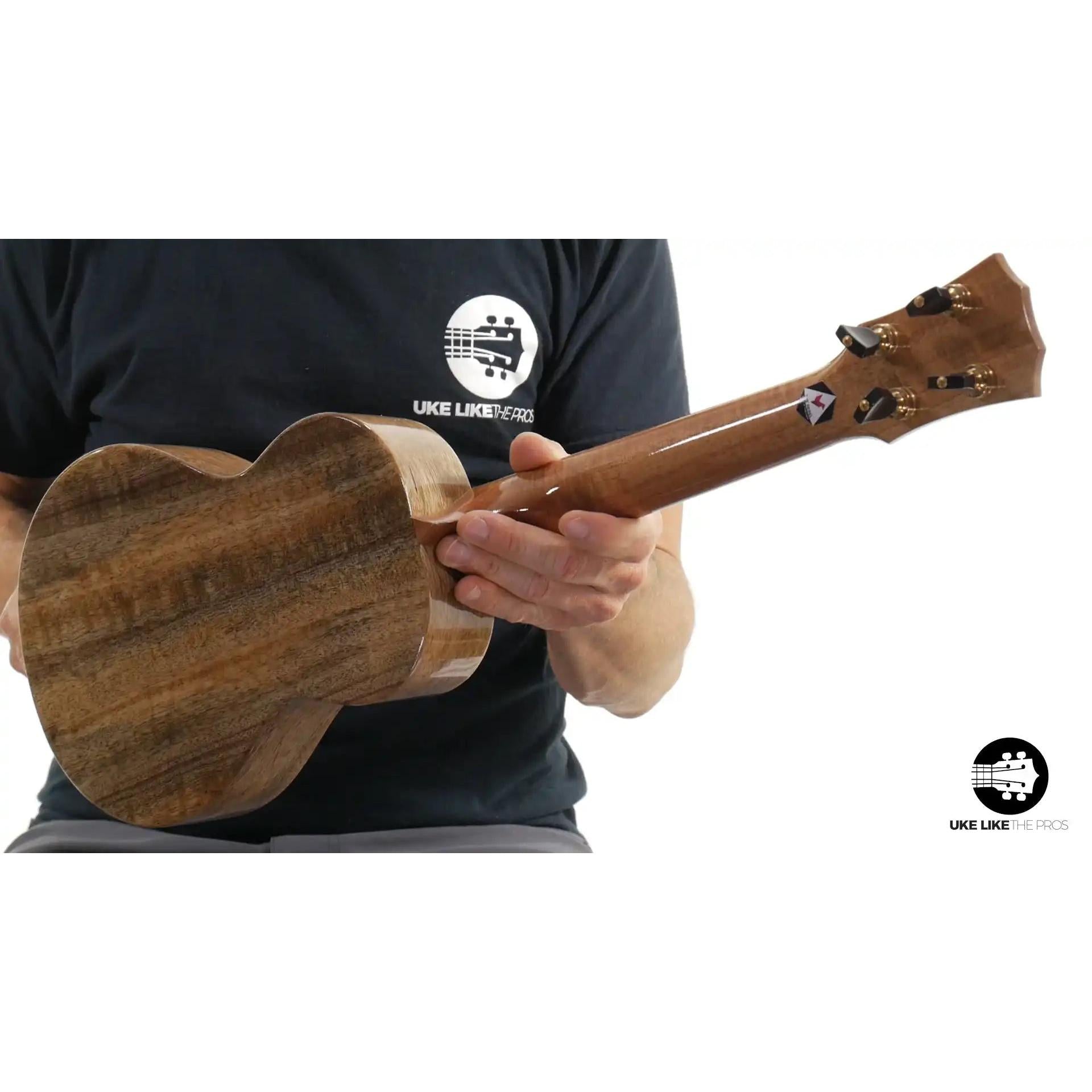 Rebel Double Creme ukulele with figured wood back and headstock, available at Terry Carter Music Store.