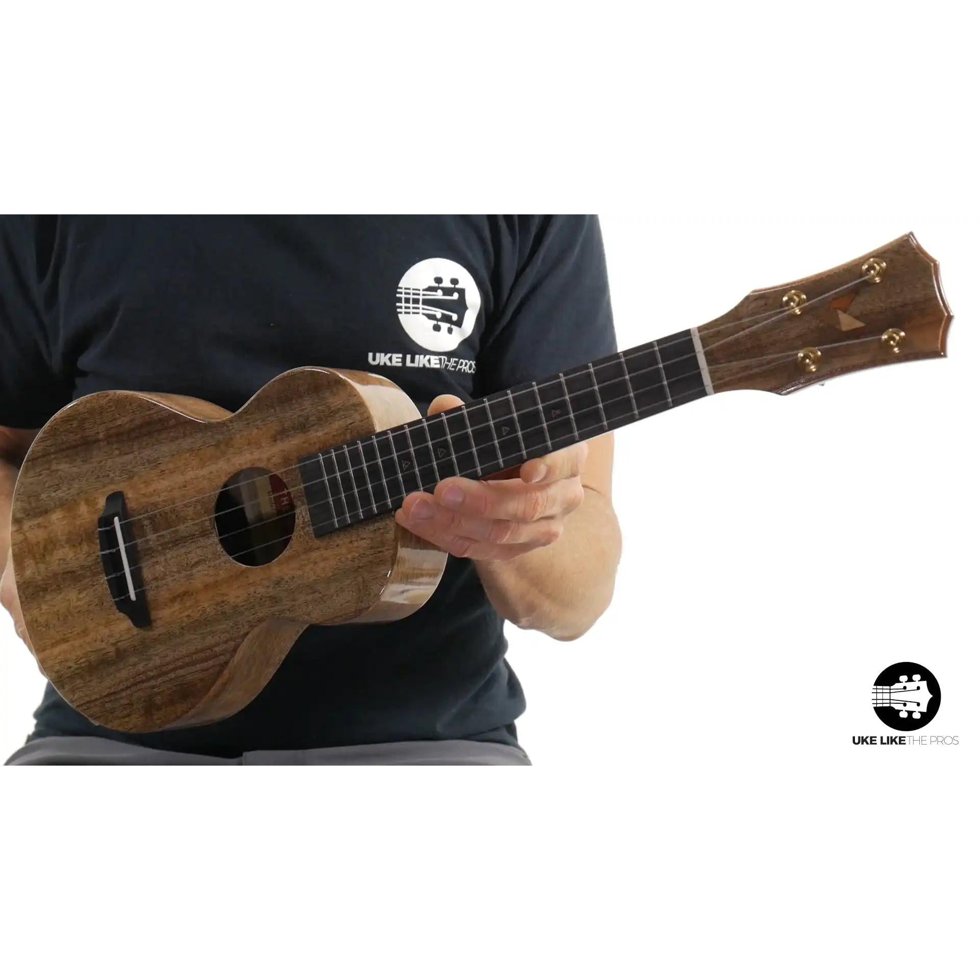 Romero Creations Rebel Double Creme ukulele with natural wood grain, Terry Carter Music Store