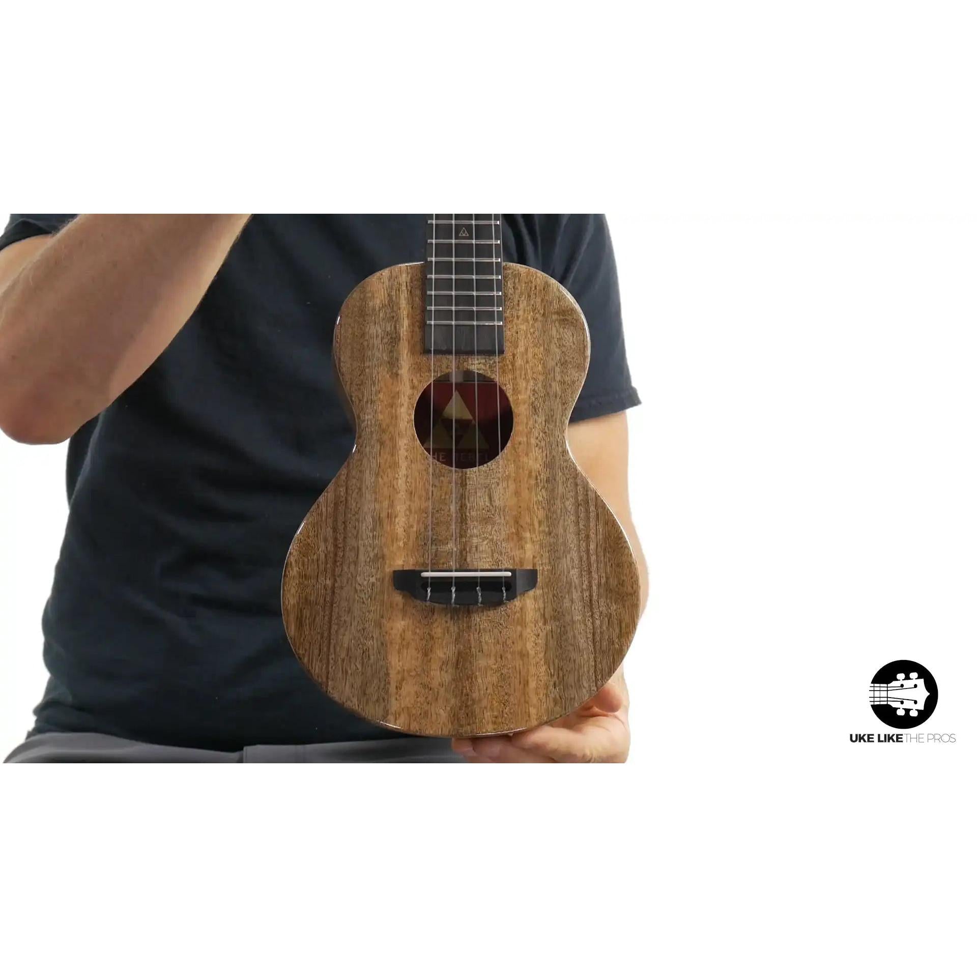 Rebel Double Creme ukulele with natural wood grain, featured at Terry Carter Music Store