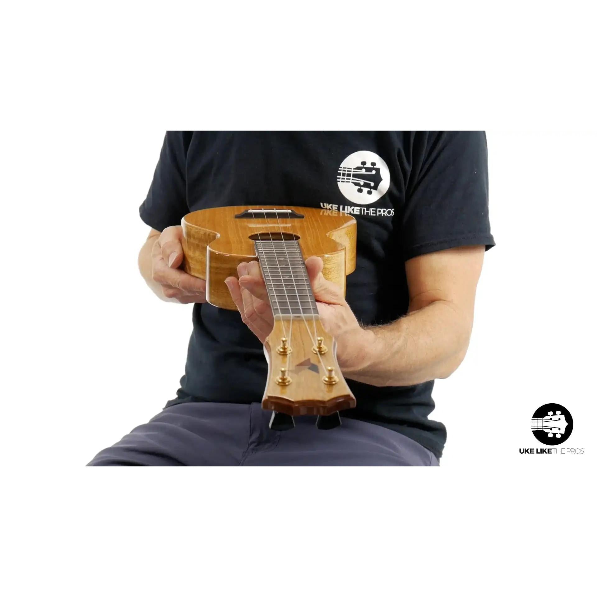Rebel Double Creme ukulele with natural wood finish, featured at Terry Carter Music Store