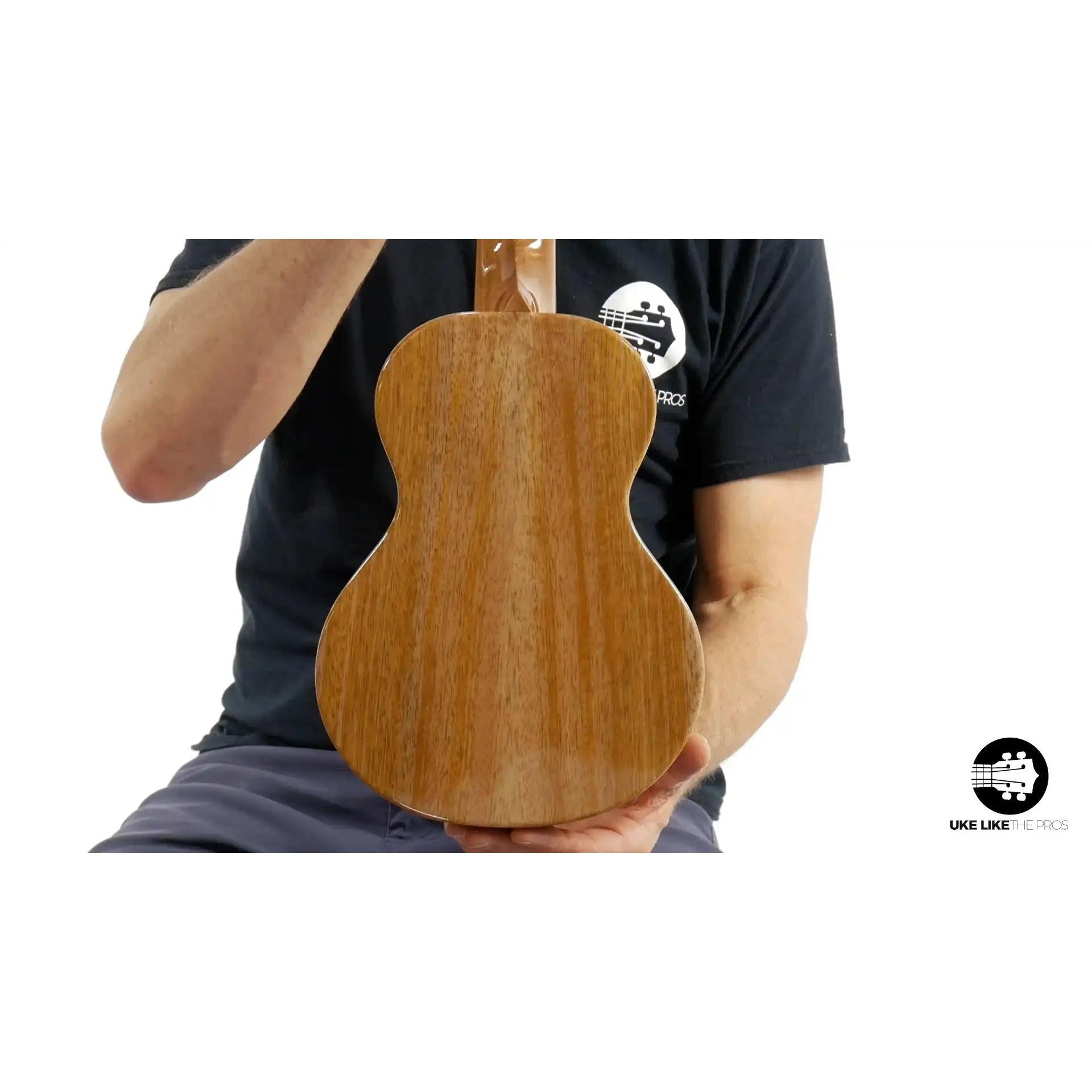 Rebel ukulele with natural wood back, showcased at Terry Carter Music Store