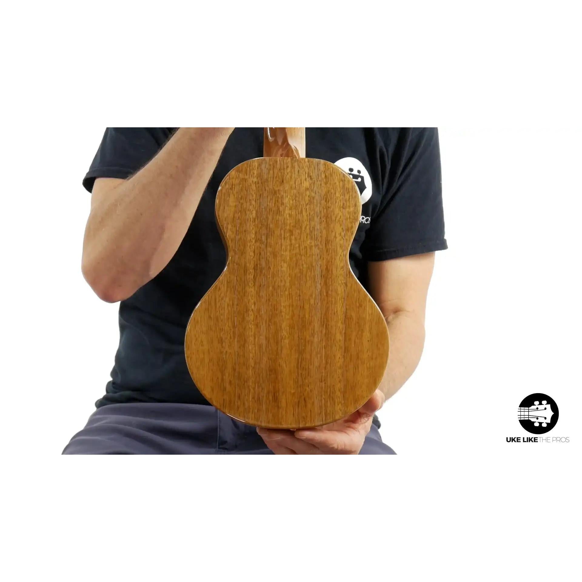 Back view of Rebel Double Creme Concert ukulele, natural wood finish, at Terry Carter Music Store