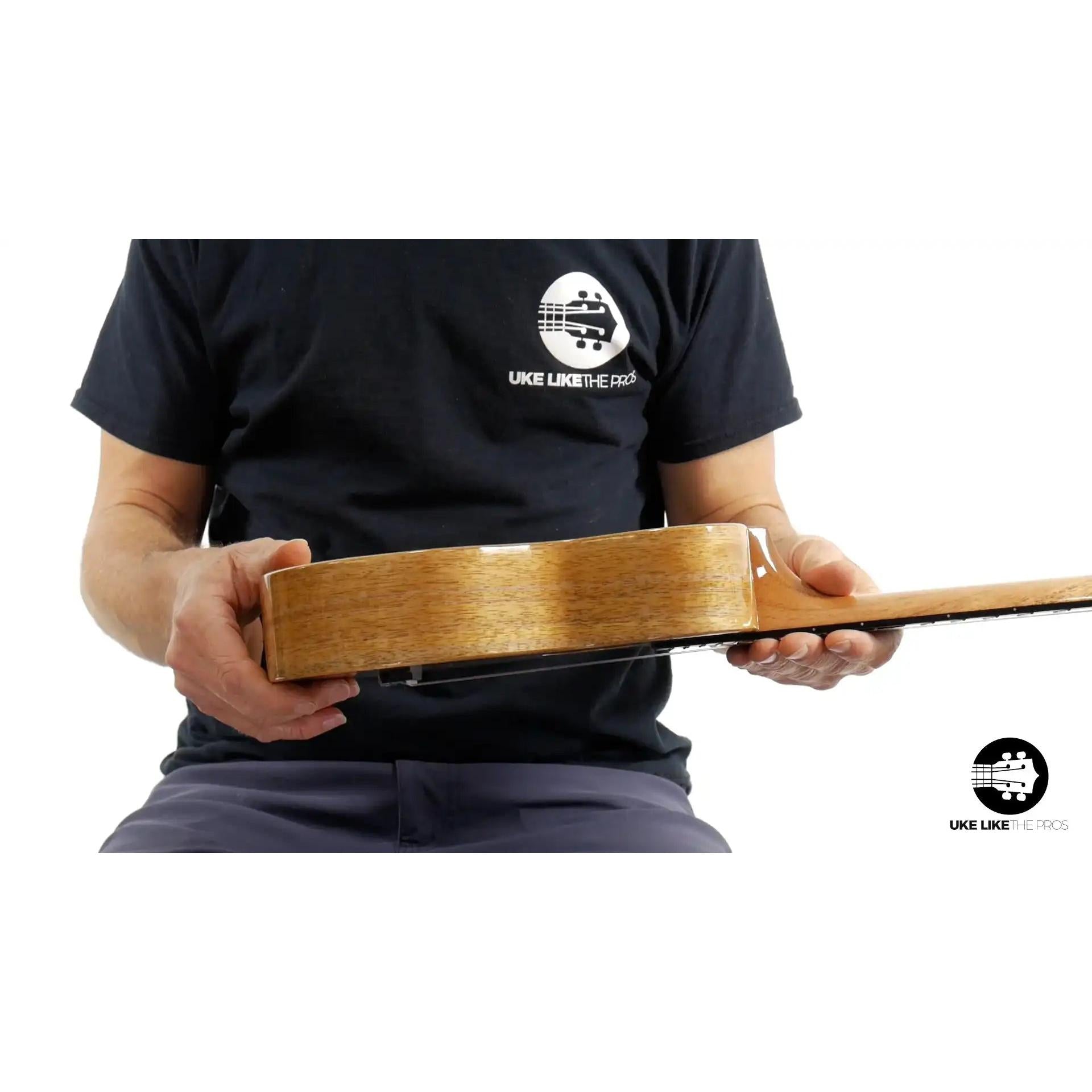 Rebel Double Creme ukulele side view with natural wood finish at Terry Carter Music Store