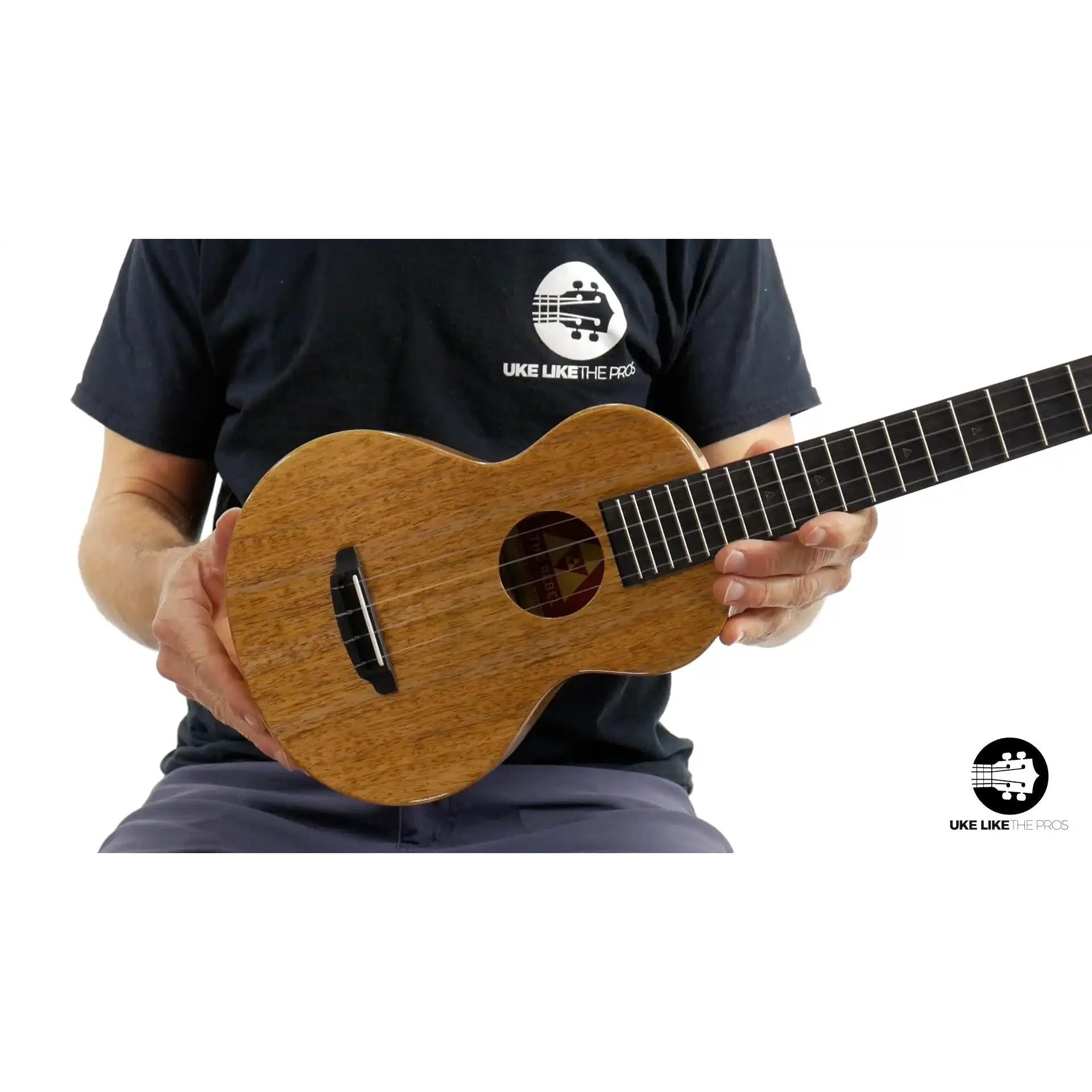 Rebel Double Creme Concert ukulele with natural wood finish, featured at Terry Carter Music Store