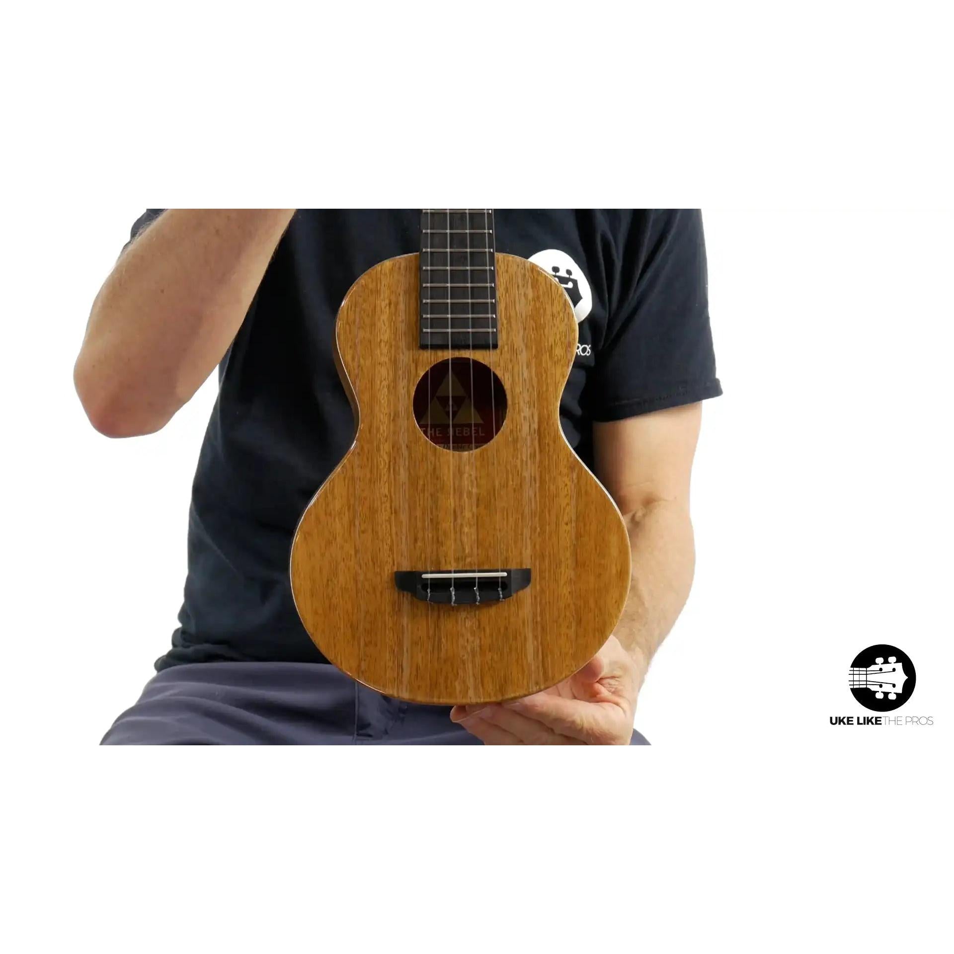The Rebel Double Creme ukulele with natural wood finish at Terry Carter Music Store.