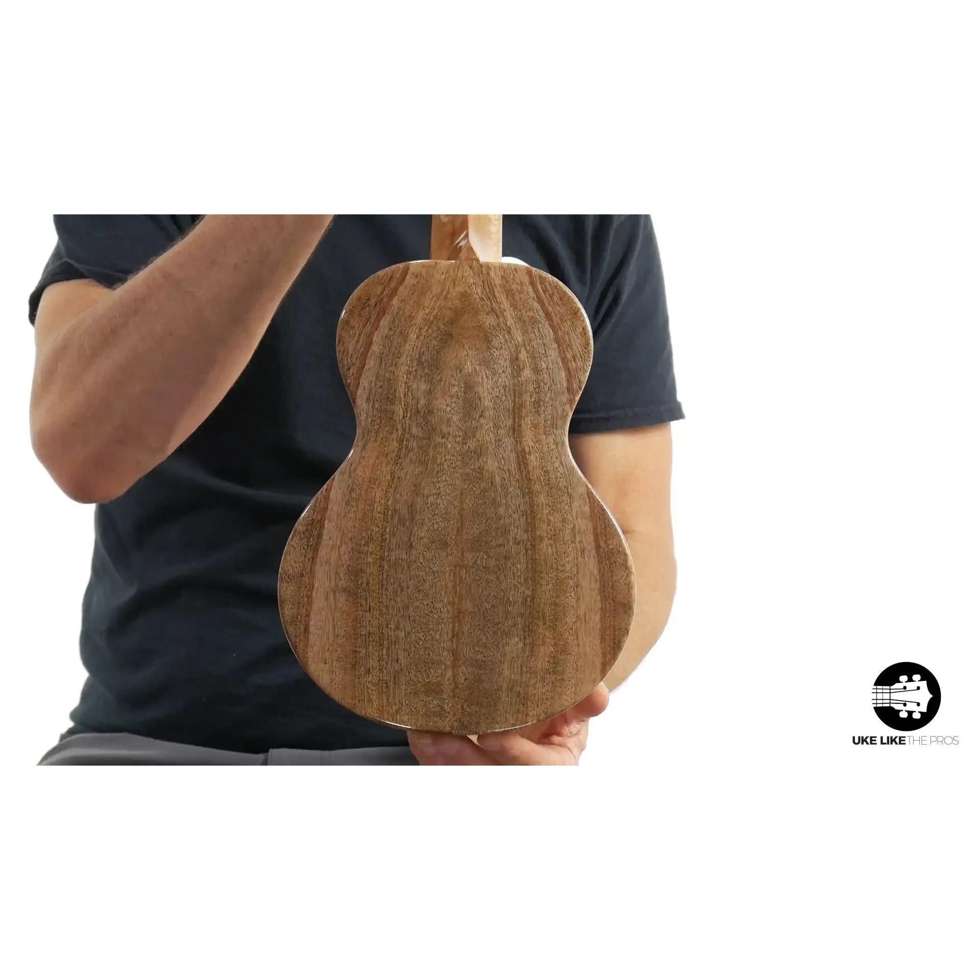 Rebel Double Creme ukulele back with natural wood grain, Terry Carter Music Store