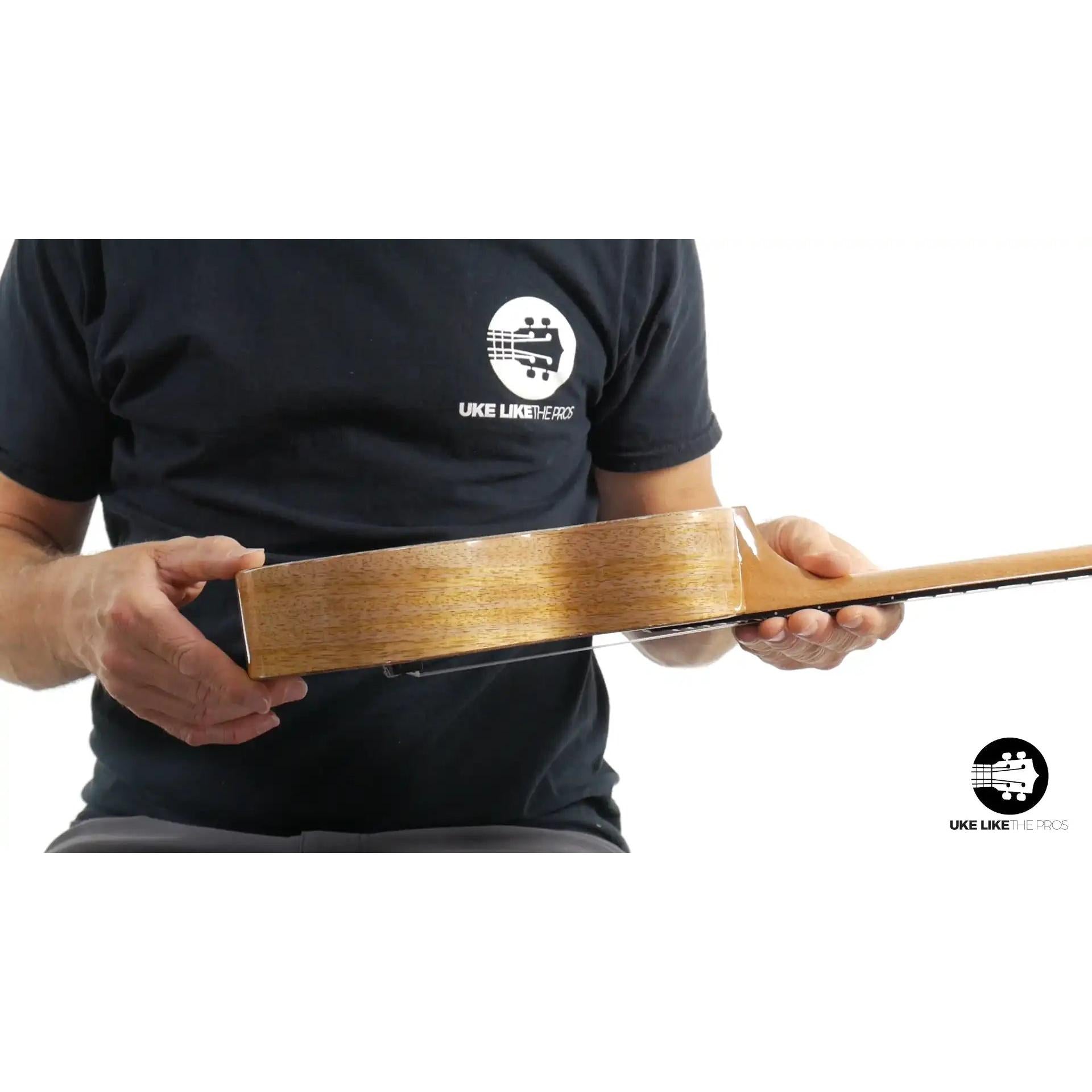 Side view of Rebel Double Creme ukulele natural wood finish, Terry Carter Music Store