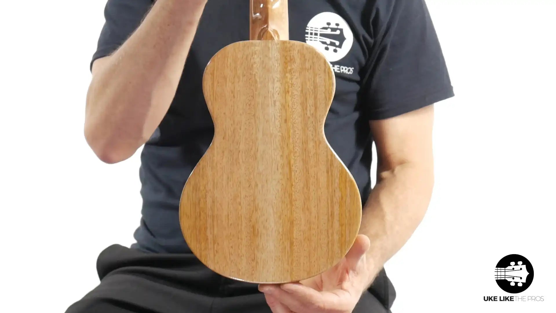 Back view of Rebel Double Creme Mango Magic ukulele with natural mango wood, Terry Carter Music Store