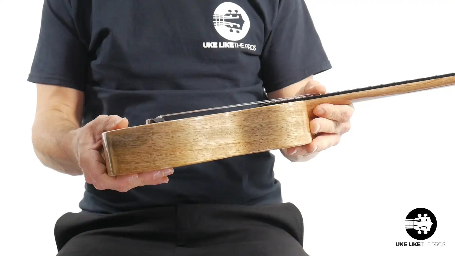 Rebel Double Creme Mango Magic ukulele side view, natural wood finish, at Terry Carter Music Store.