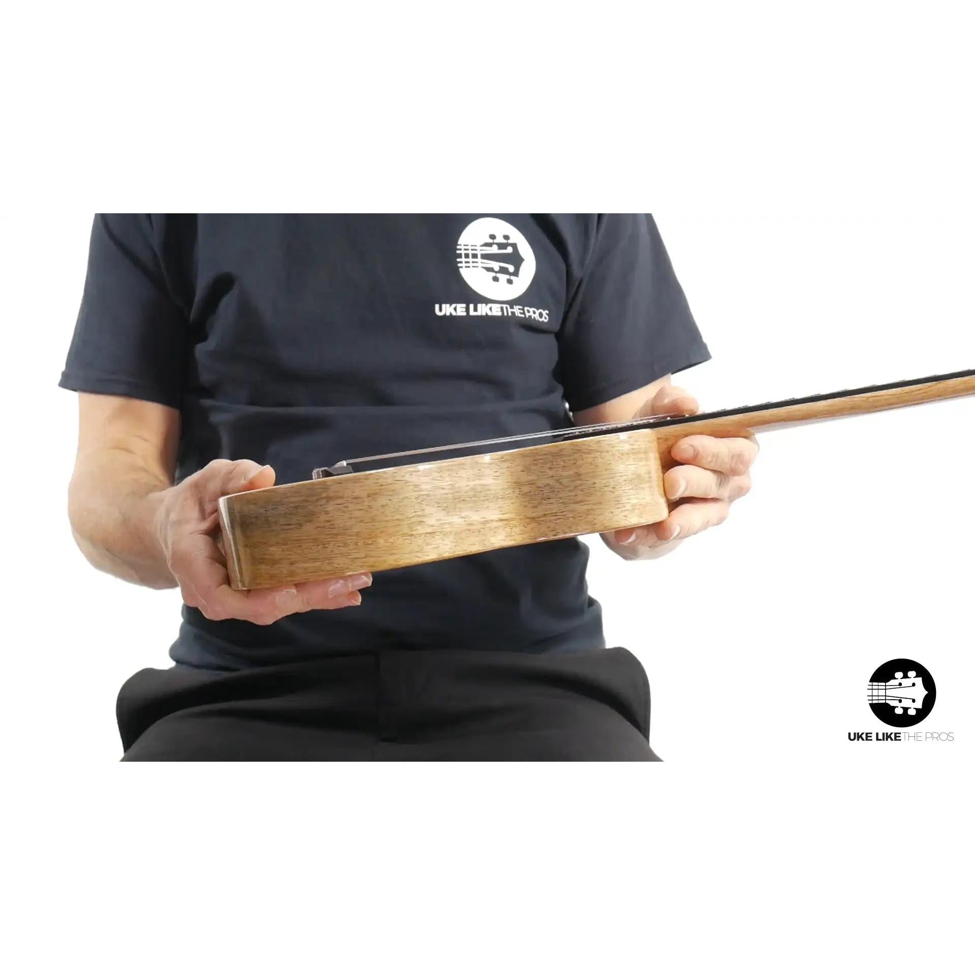 Rebel Double Creme Mango Magic ukulele side view, natural wood finish, at Terry Carter Music Store.