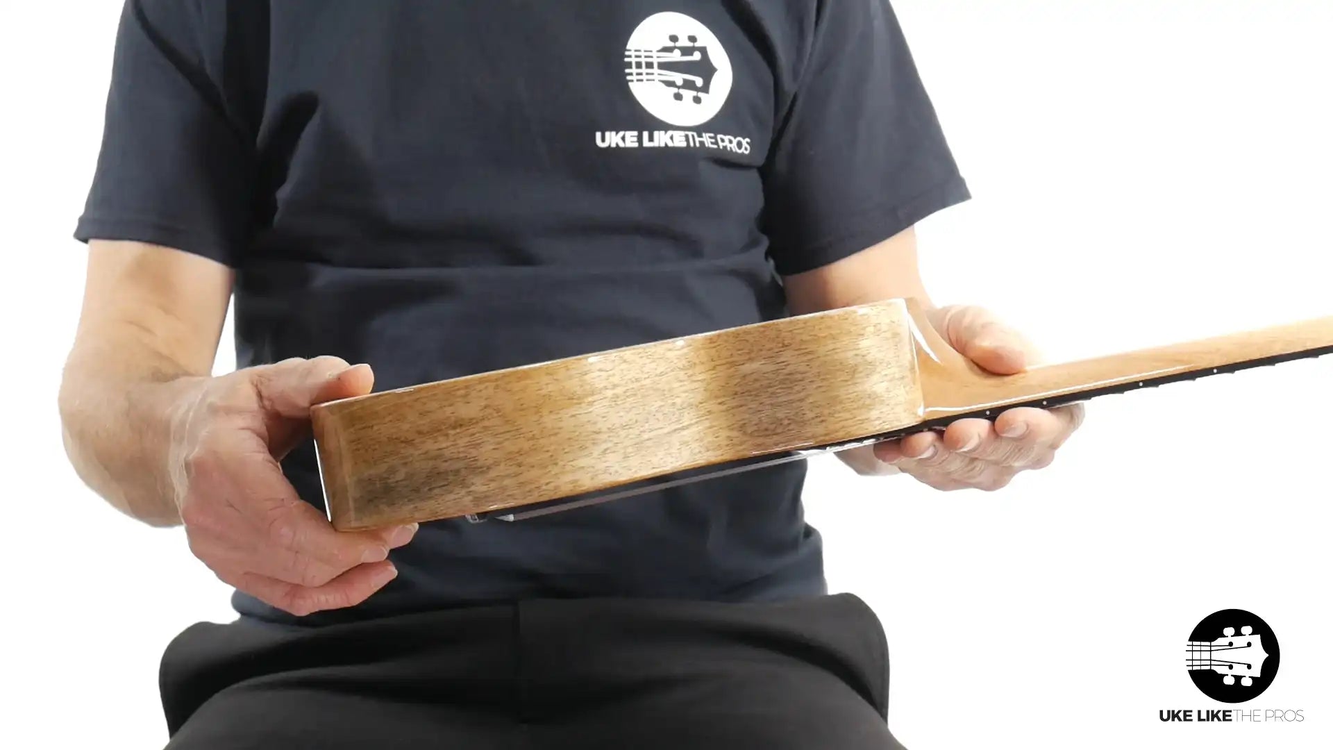 Side view of Rebel Double Creme Mango wood ukulele at Terry Carter Music Store