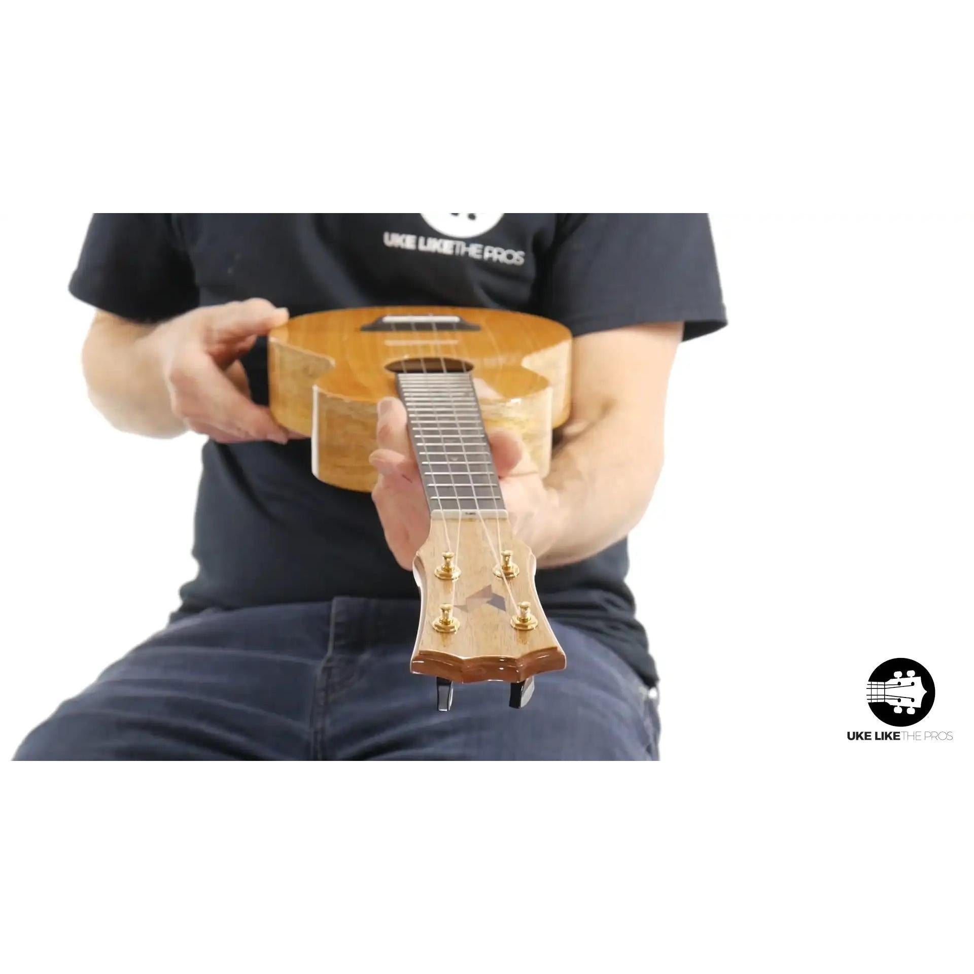 Rebel Double Creme Oingo Boingo ukulele with natural wood finish, Terry Carter Music Store.