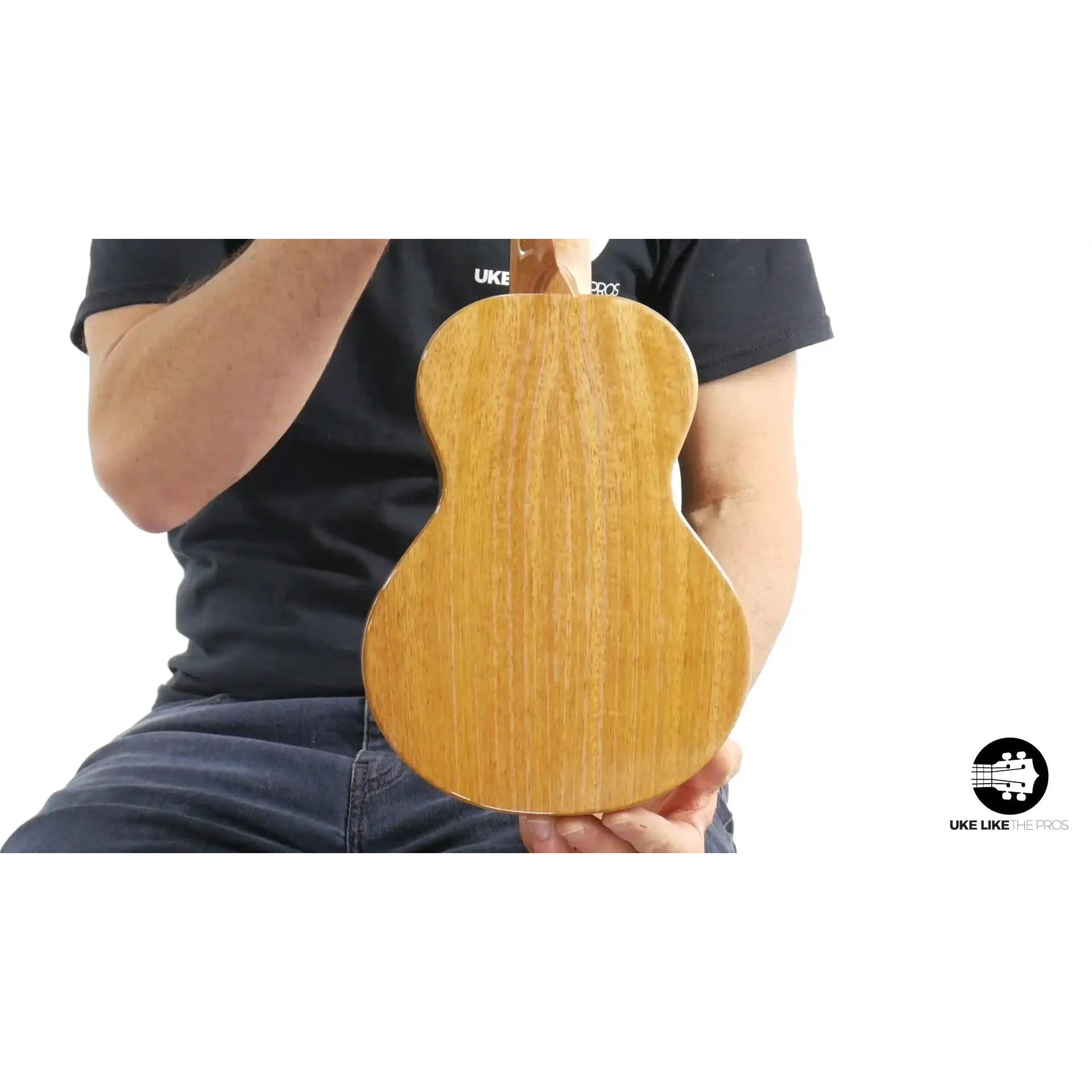 Rebel ukulele back view, natural wood grain finish, Terry Carter Music Store