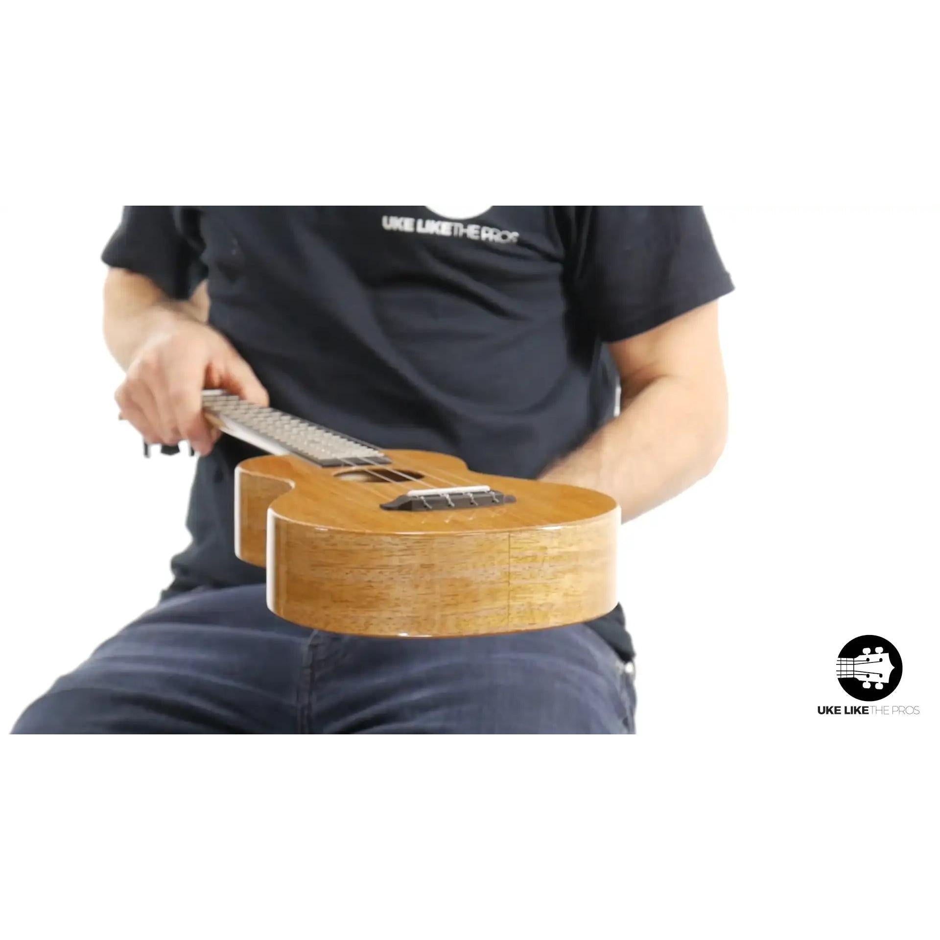 Rebel Double Creme ukulele with natural wood finish at Terry Carter Music Store