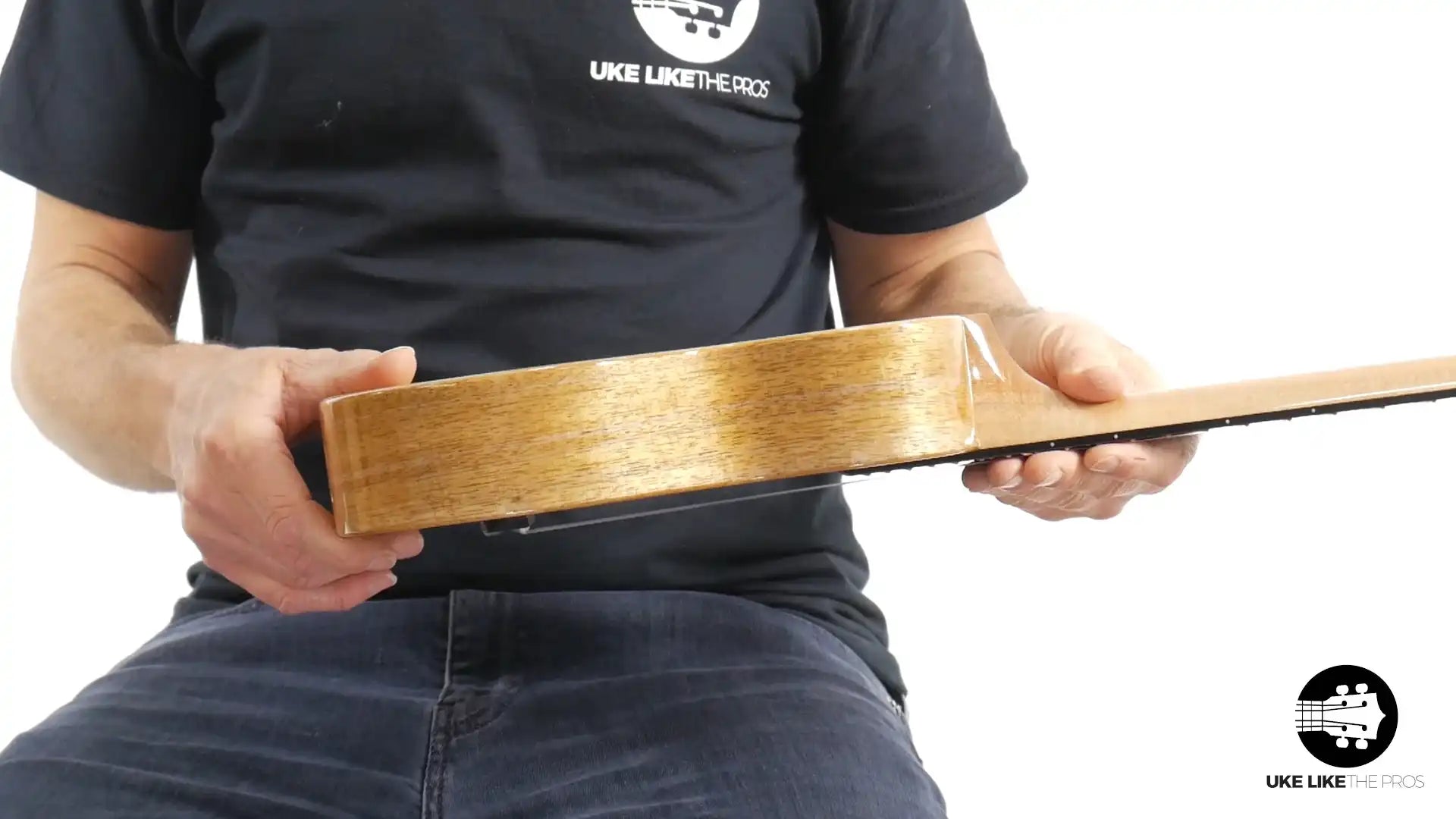 Side view of Rebel ukulele with natural wood body at Terry Carter Music Store