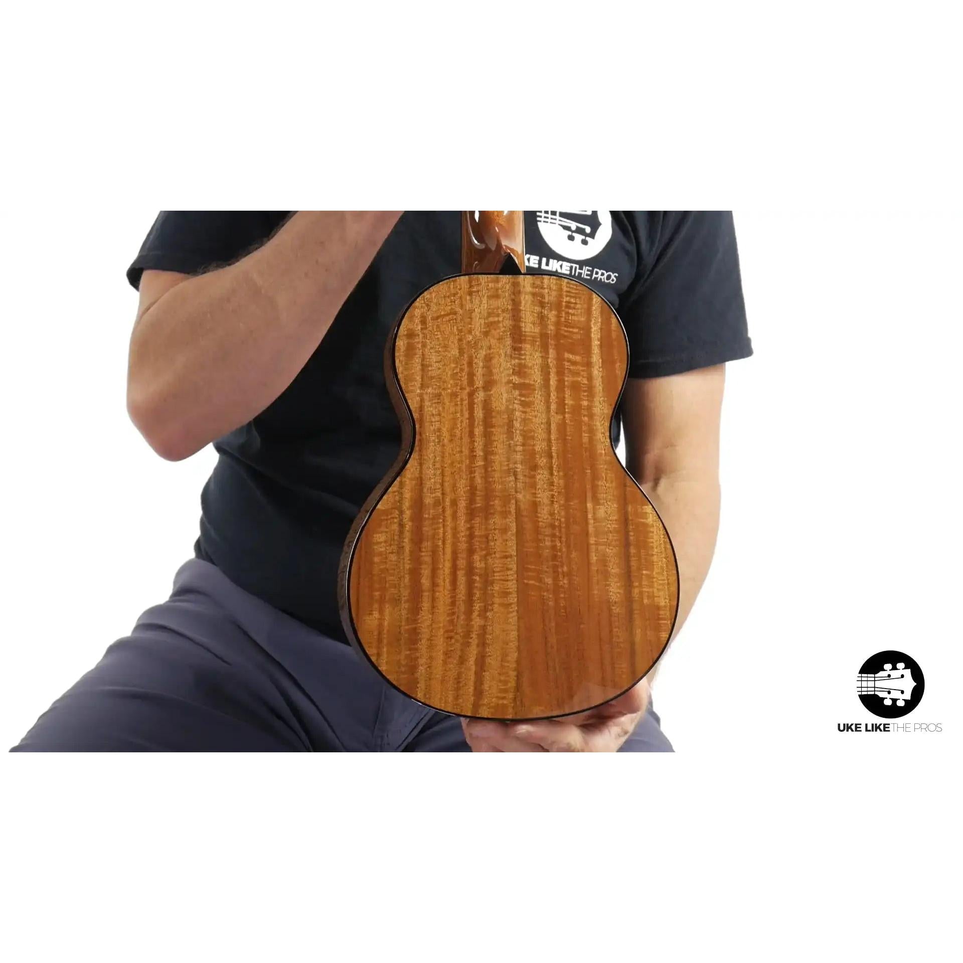 Rebel ukulele with stunning flame koa wood back, displayed at Terry Carter Music Store.