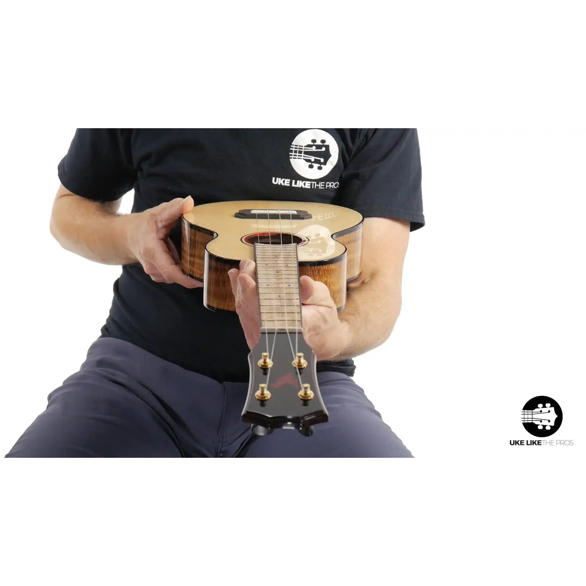 Rebel Pluto Imperial Guard ukulele with natural wood finish, featured at Terry Carter Music Store