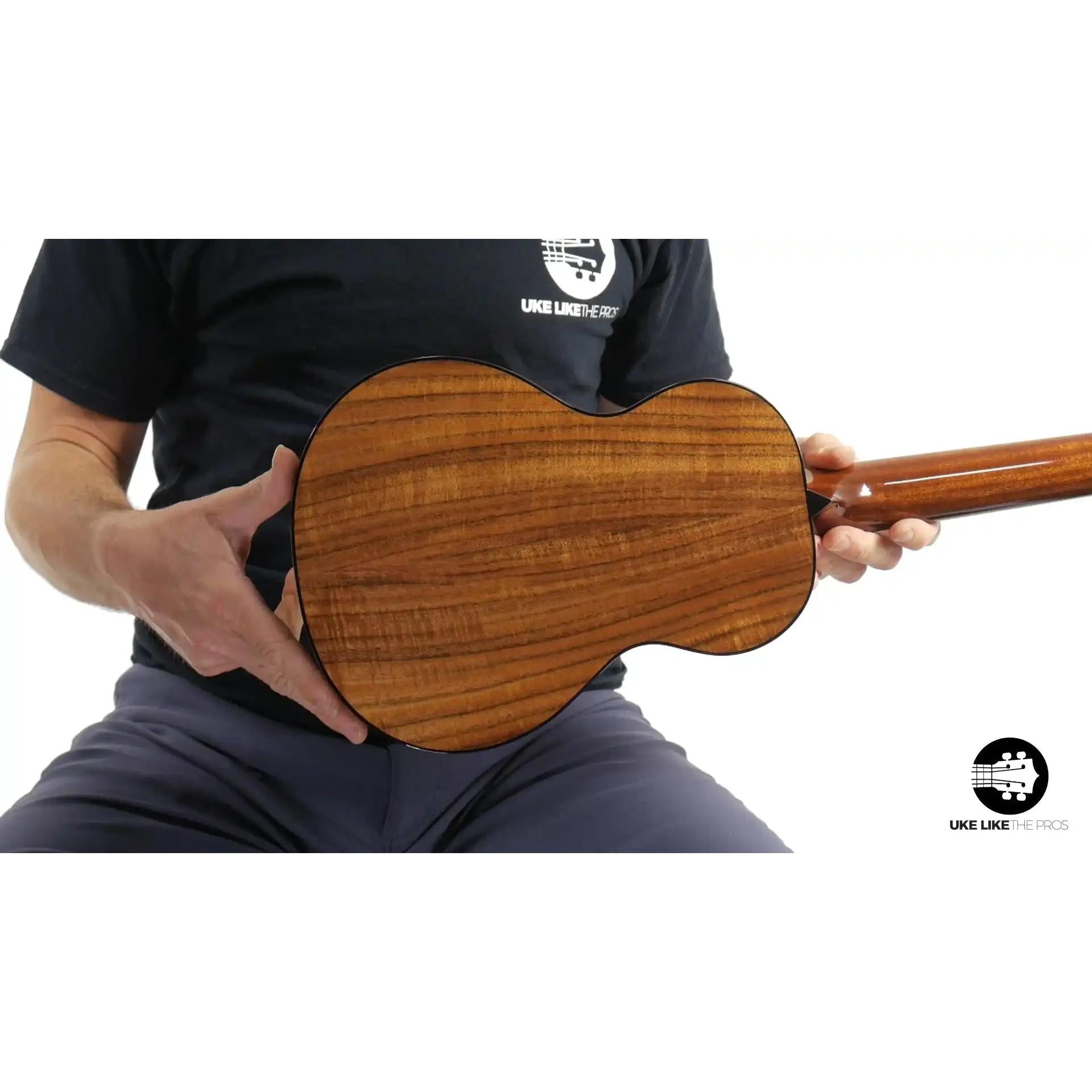 Rebel ukulele back view with natural wood grain, featured at Terry Carter Music Store