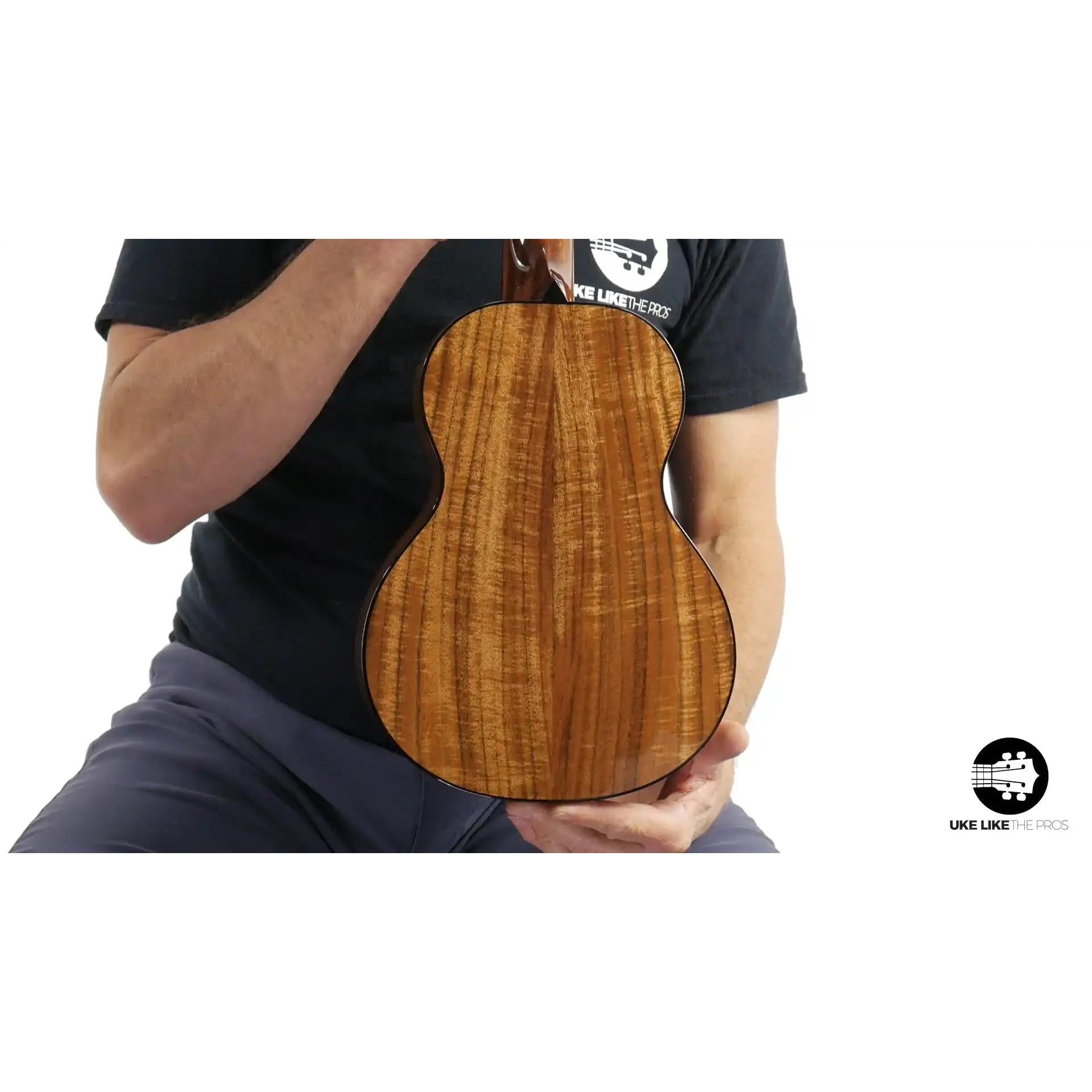 Rebel ukulele with figured wood back displayed at Terry Carter Music Store.
