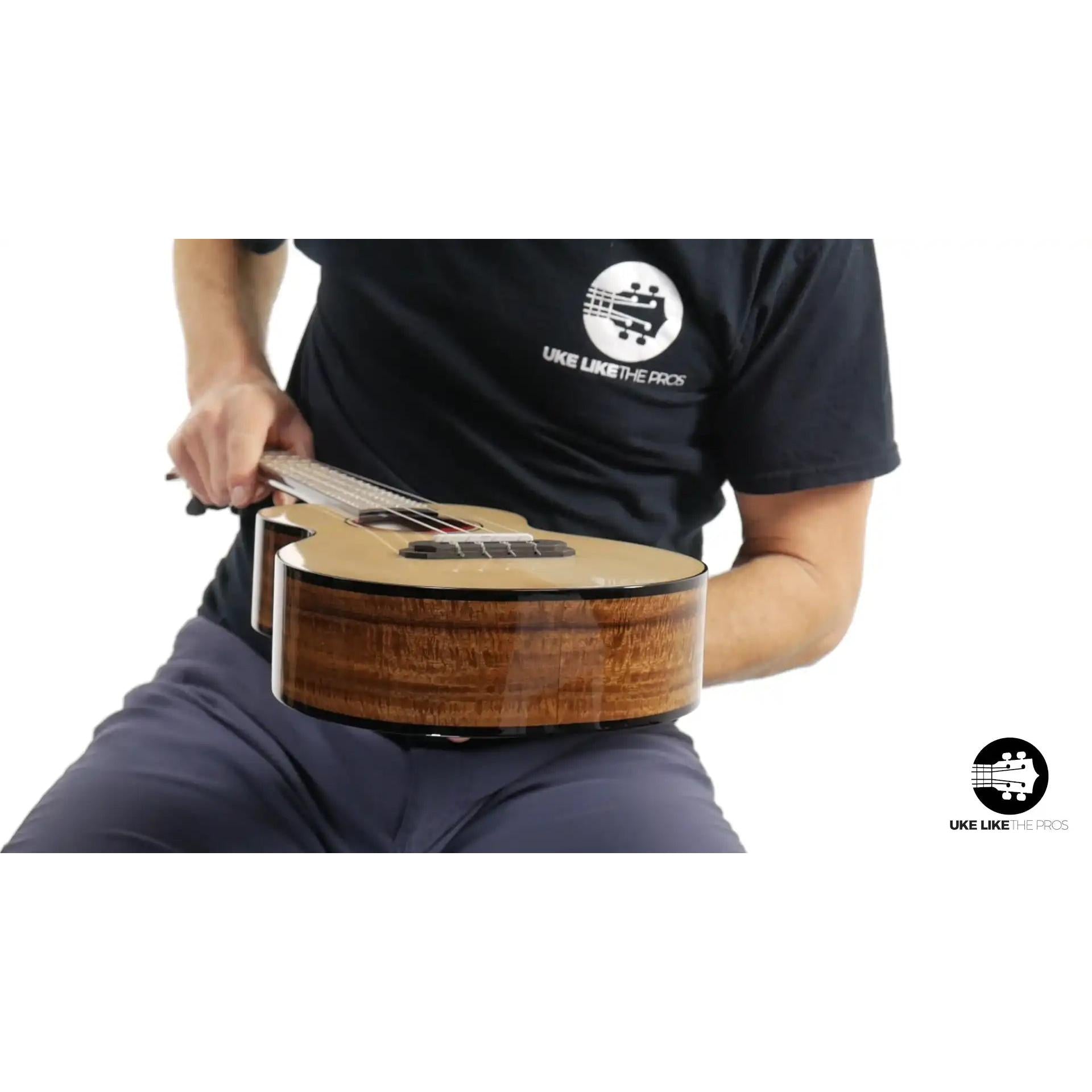 Rebel ukulele with glossy koa wood sides showcased at Terry Carter Music Store