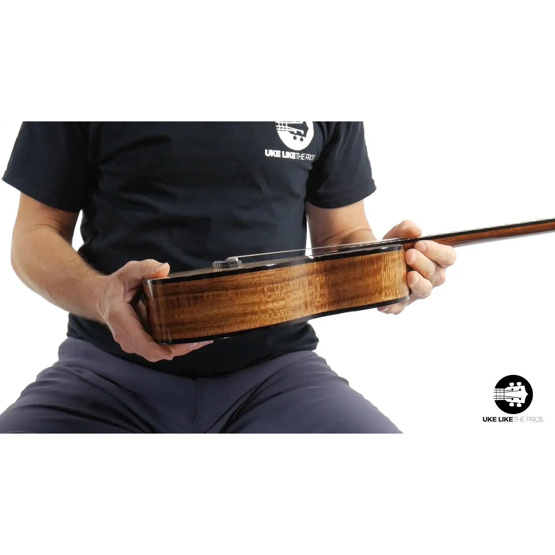 Side view of a Rebel ukulele with figured wood at Terry Carter Music Store.