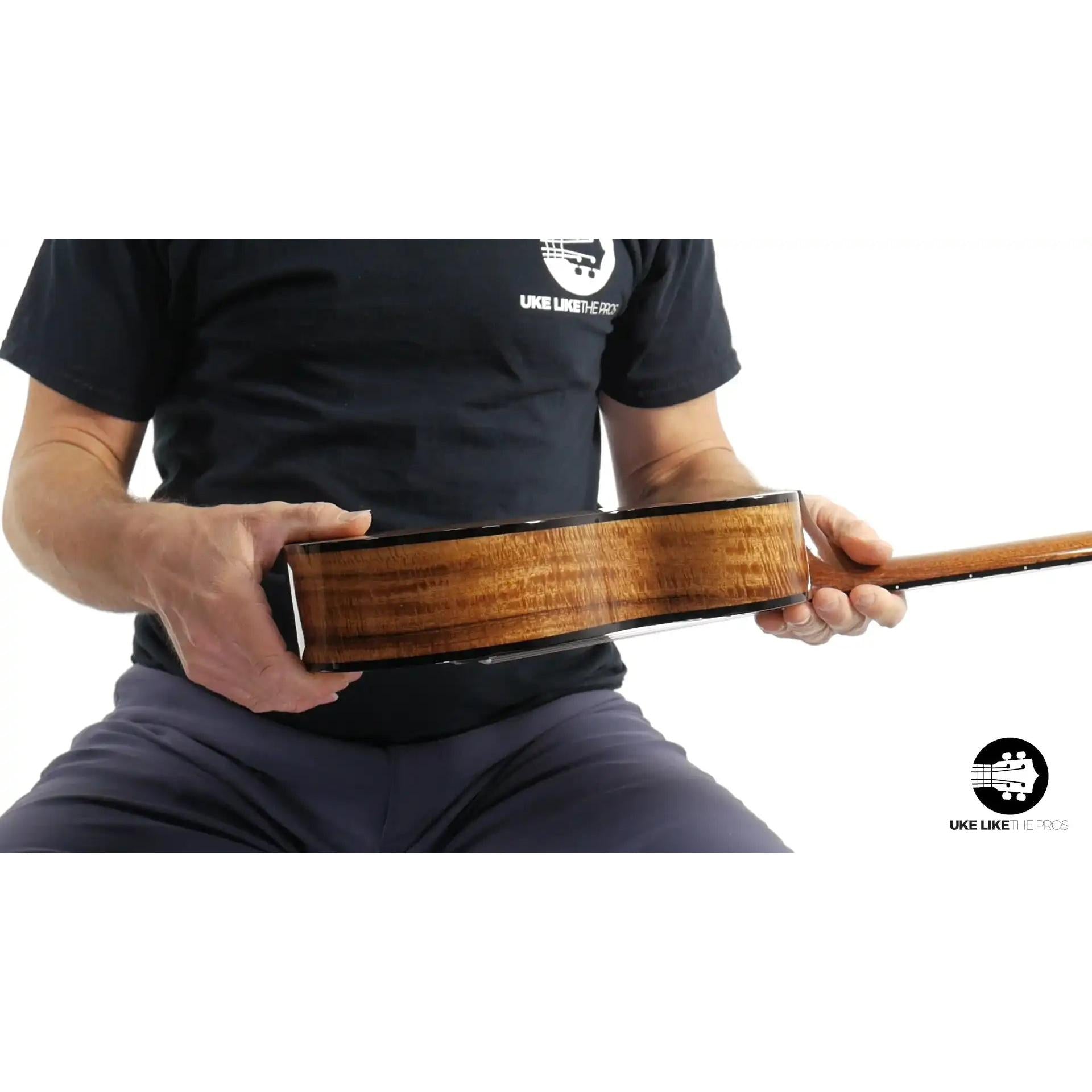 Side view of Rebel Pluto Imperial Guard ukulele with figured wood at Terry Carter Music Store
