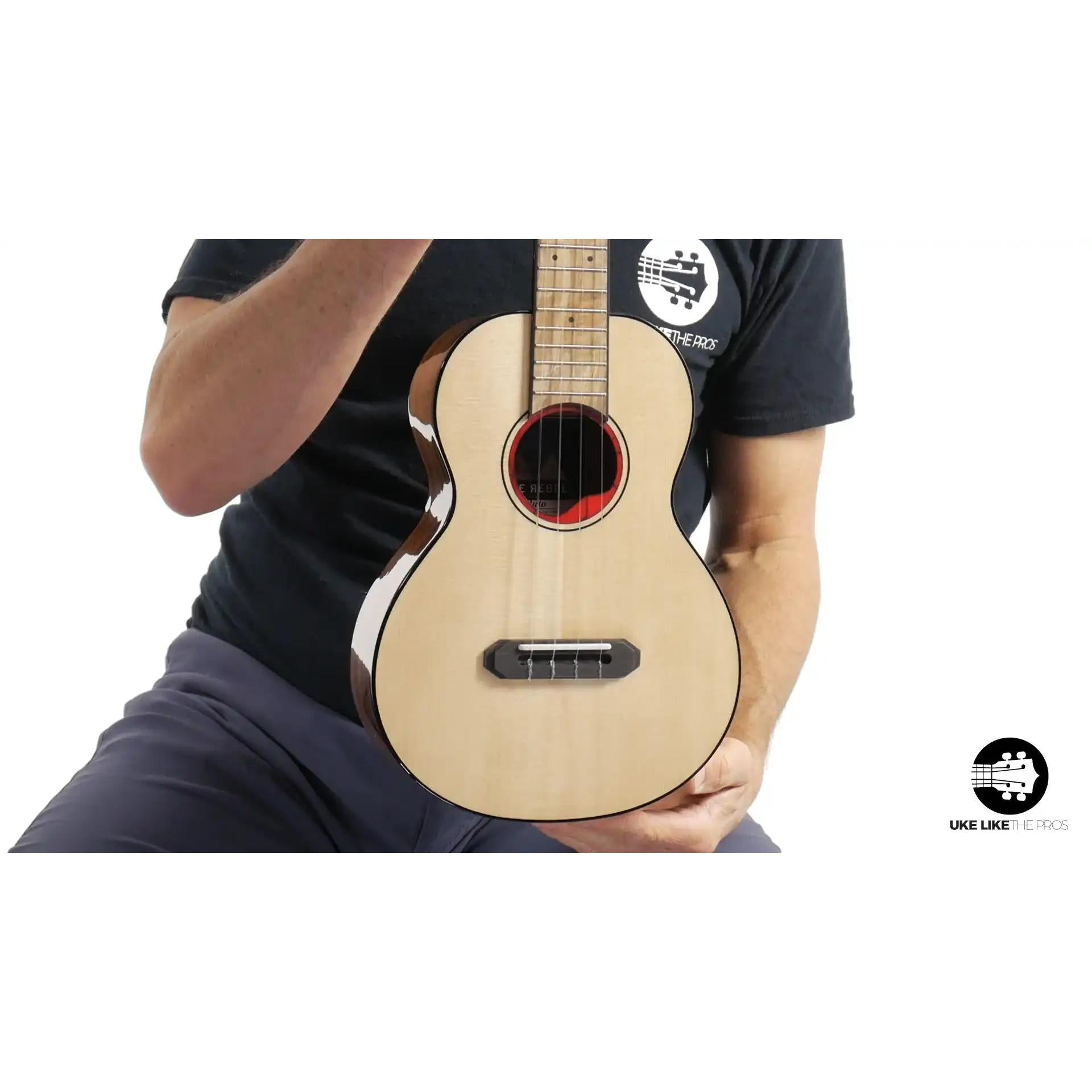Rebel Pluto Imperial Guard ukulele with spruce top, showcased at Terry Carter Music Store