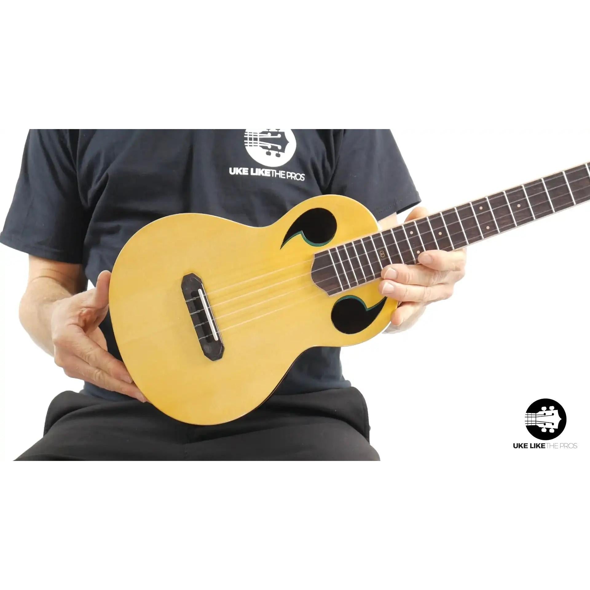 Rebel Quark ukulele with spruce top and unique soundholes, showcased at Terry Carter Music Store
