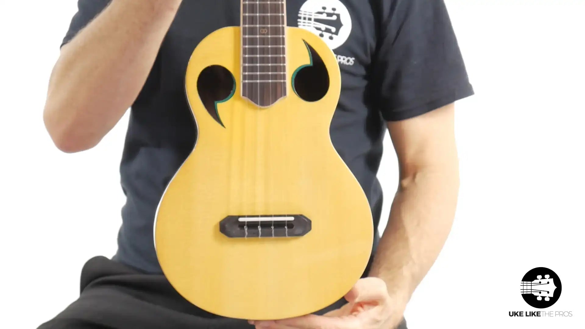 Rebel Quark ukulele with unique sound holes and natural wood top at Terry Carter Music Store