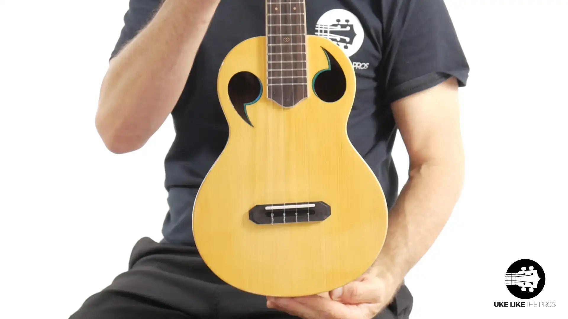 Rebel Quark ukulele with unique sound holes and light wood, Terry Carter Music Store