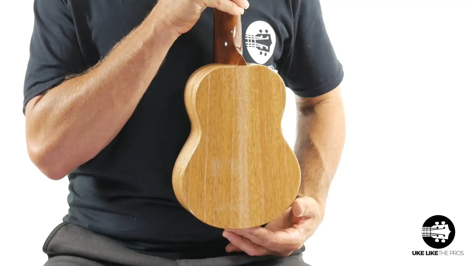 Little Giant ukulele back view with natural wood finish, displayed at Terry Carter Music Store