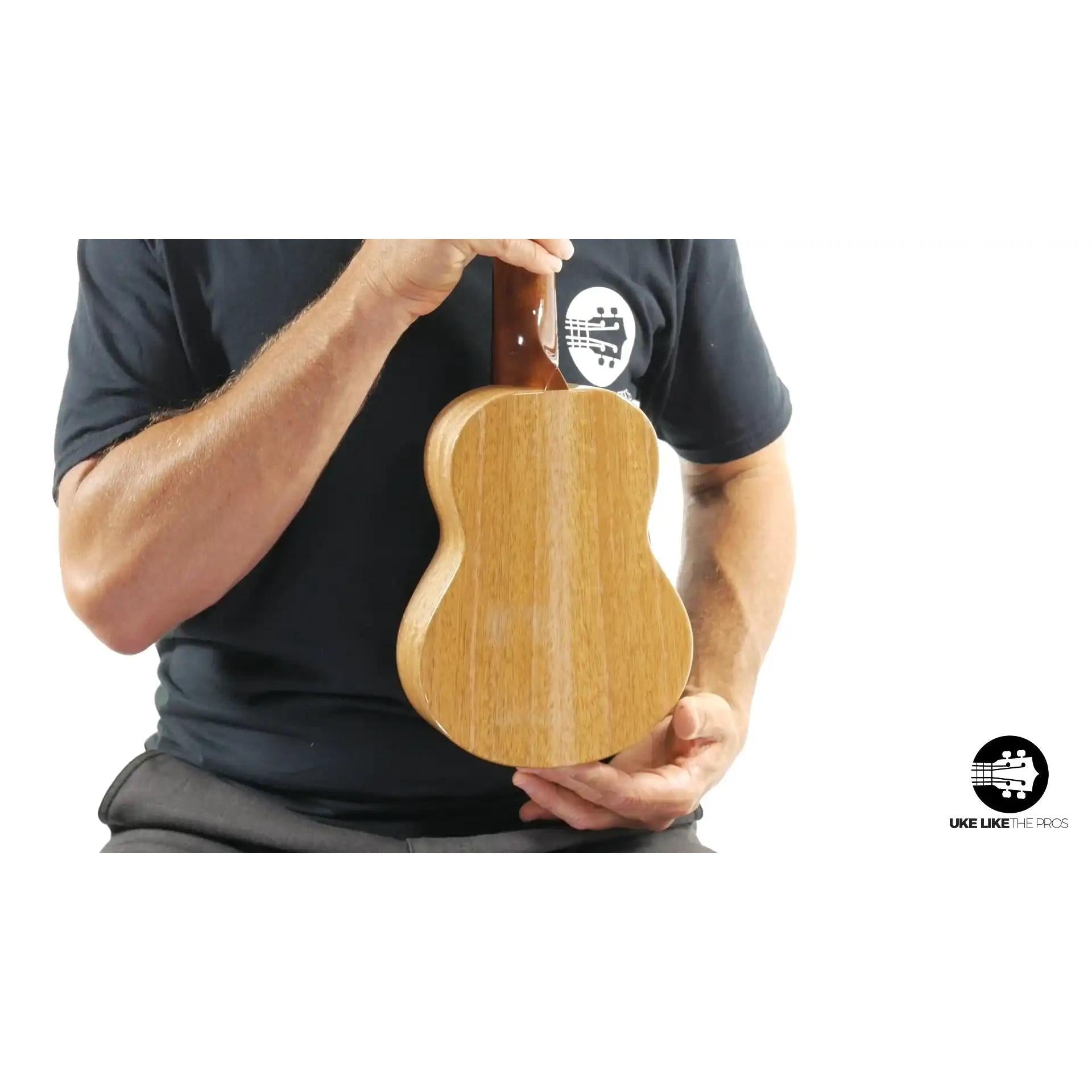 Little Giant ukulele back view with natural wood finish, displayed at Terry Carter Music Store