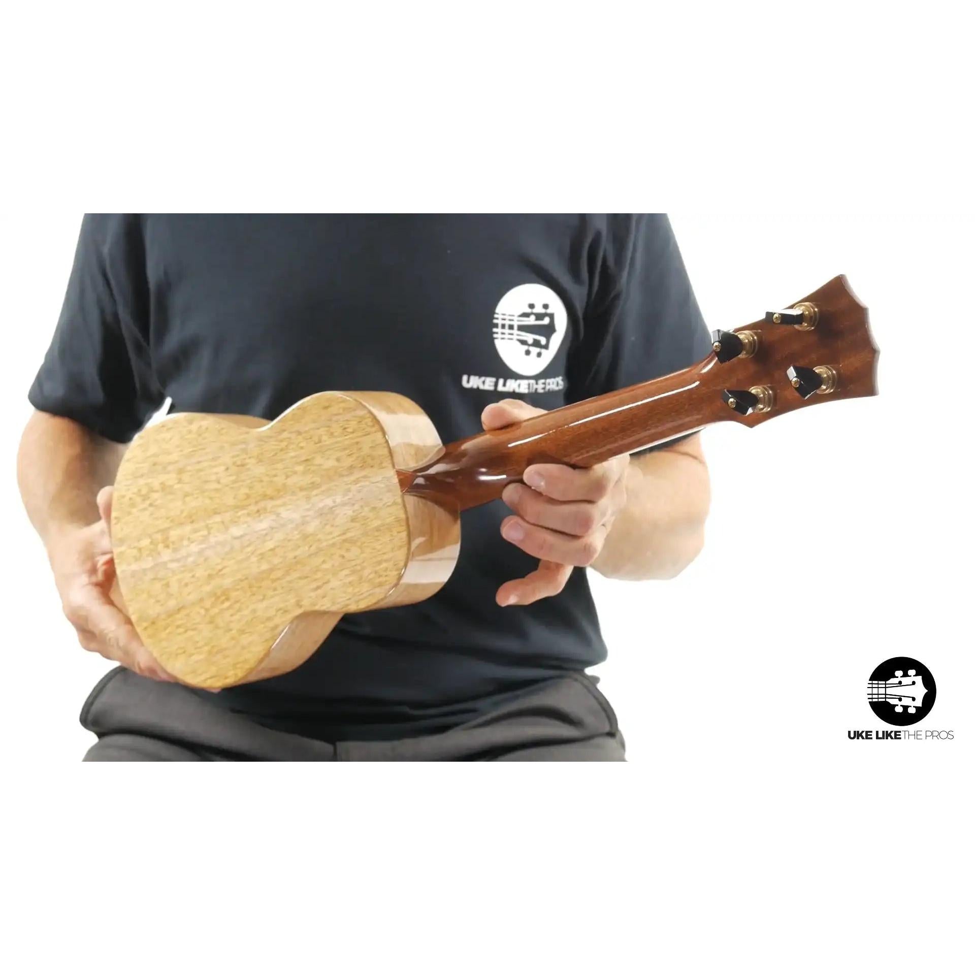 Back view of Little Giant ukulele with natural wood grain at Terry Carter Music Store