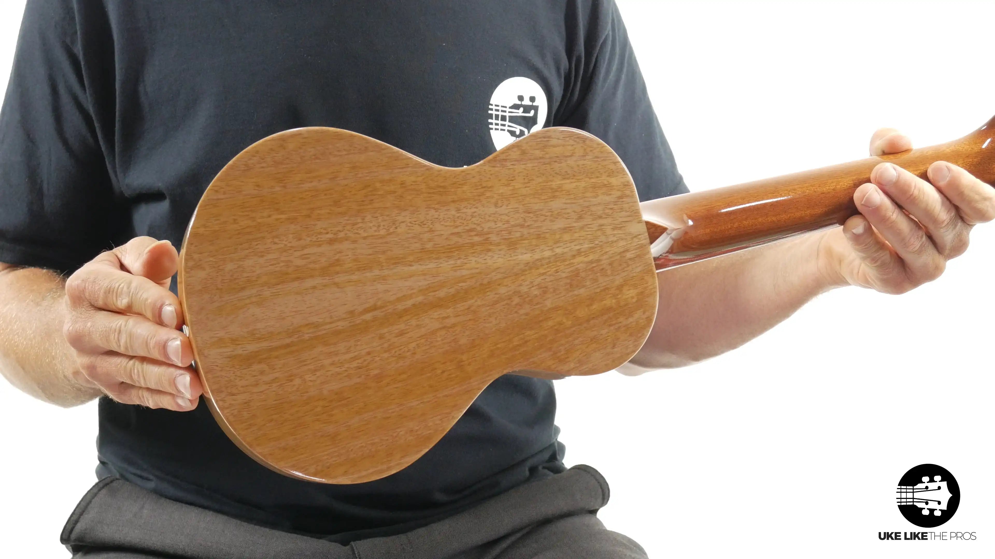 Back view of Rebel ukulele with natural wood finish, showcased at Terry Carter Music Store
