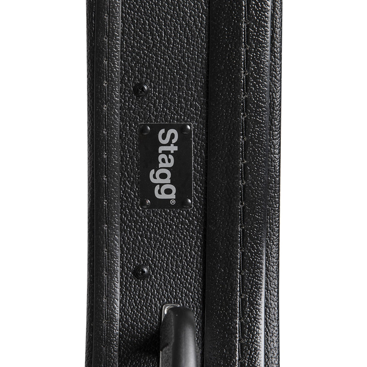 Stagg GCA-M mandolin case, close-up of the Stagg badge and black textured vinyl covering