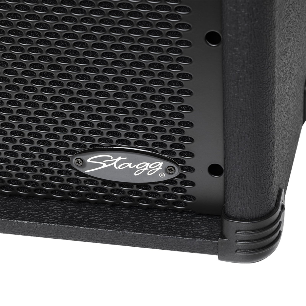 Close-up of the Stagg logo on the grille and the corner protector of the Stagg 20 GA amplifier