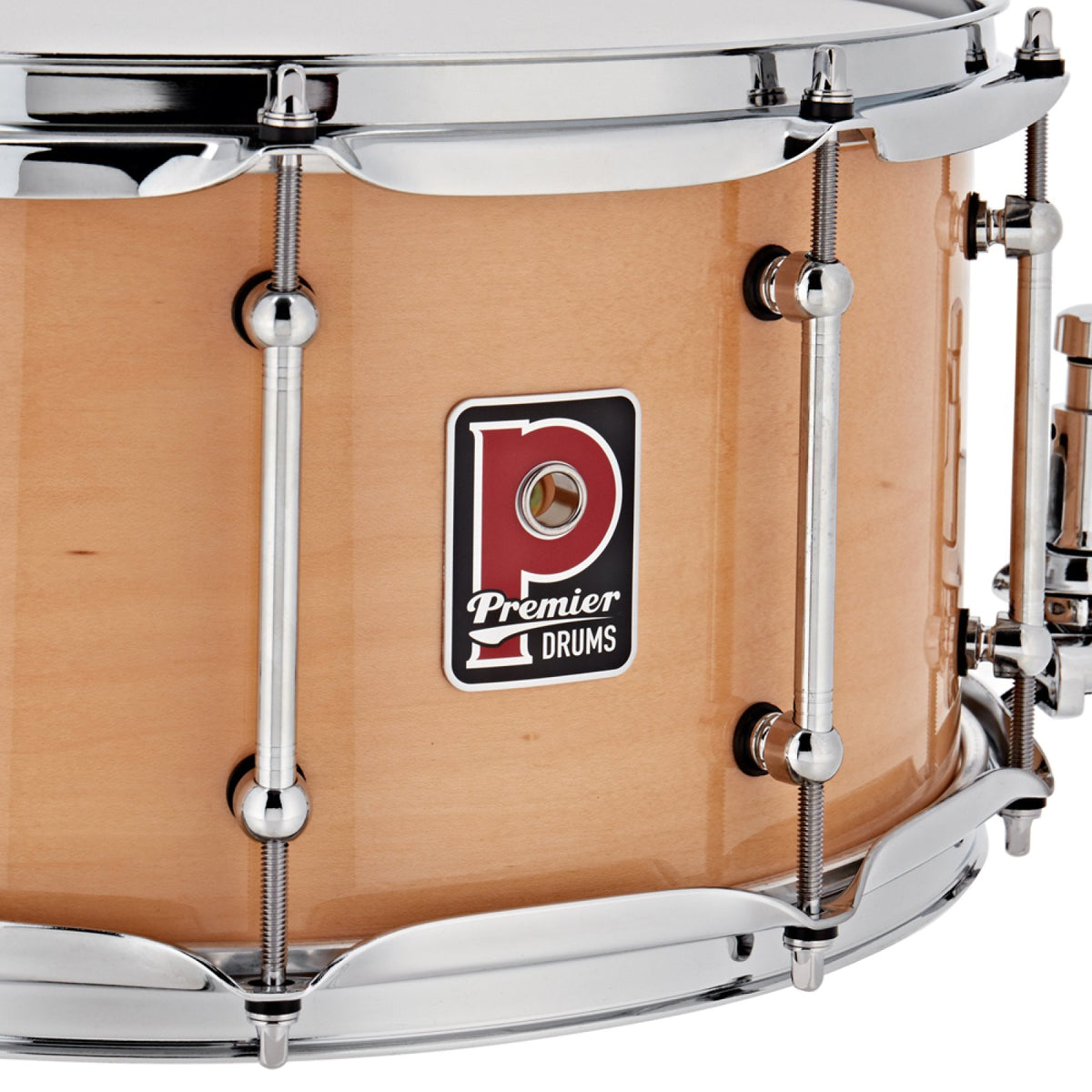 Close-up of the Premier badge and chrome tube lugs on the Premier Beatmaker 13" x 7" maple snare drum