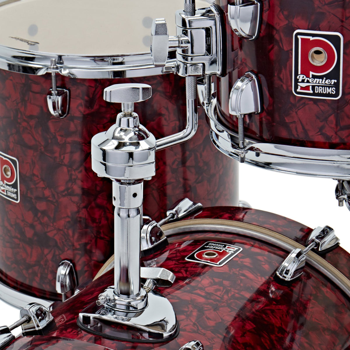 Close-up of the tom mount and bass drum hoop on the Premier Artist Heritage 16-inch 4-piece shell pack in Burgundy Pearl