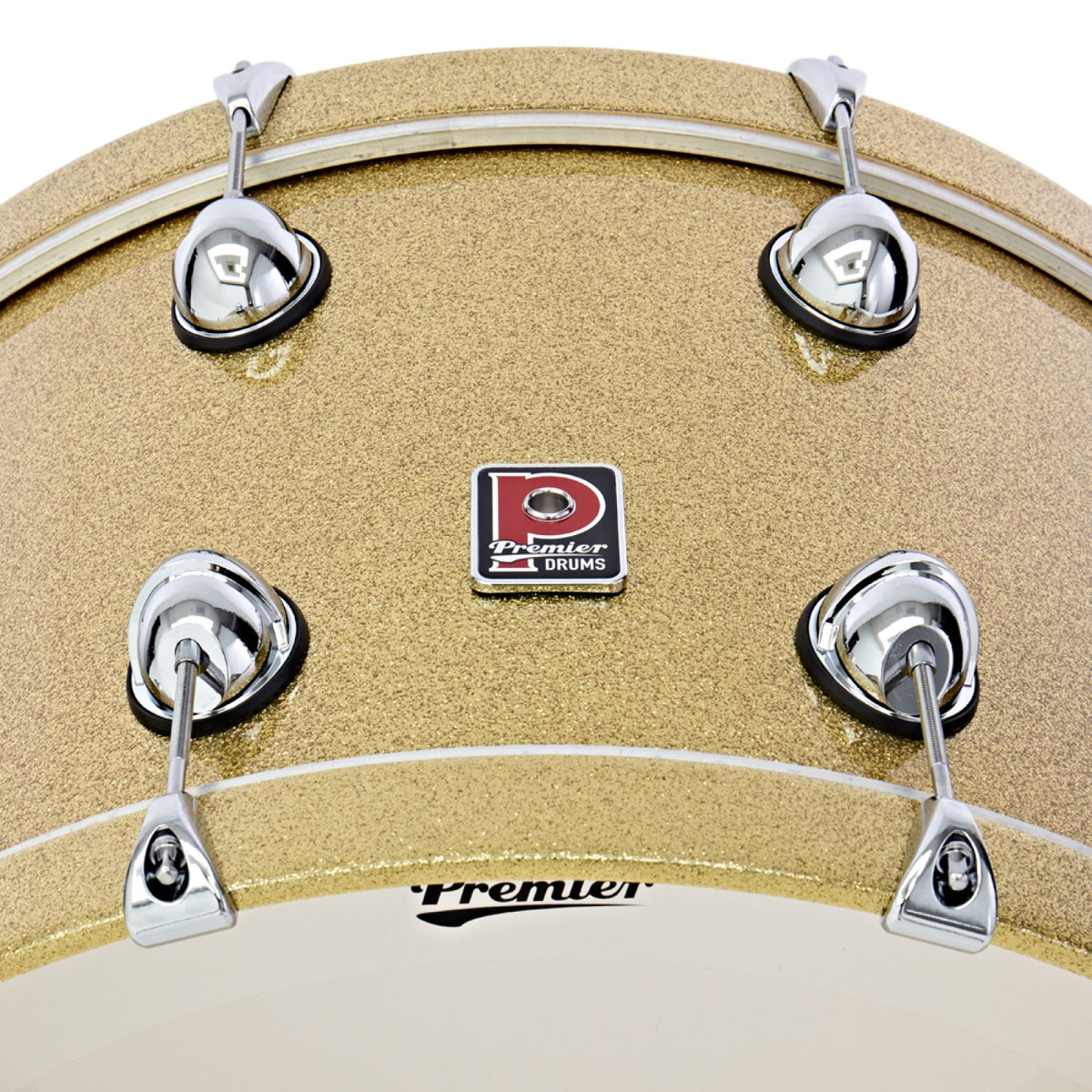 Close-up of the Premier badge, lugs and claw hooks on the Vintage Gold Sparkle Genista Heritage 24 x 14 bass drum