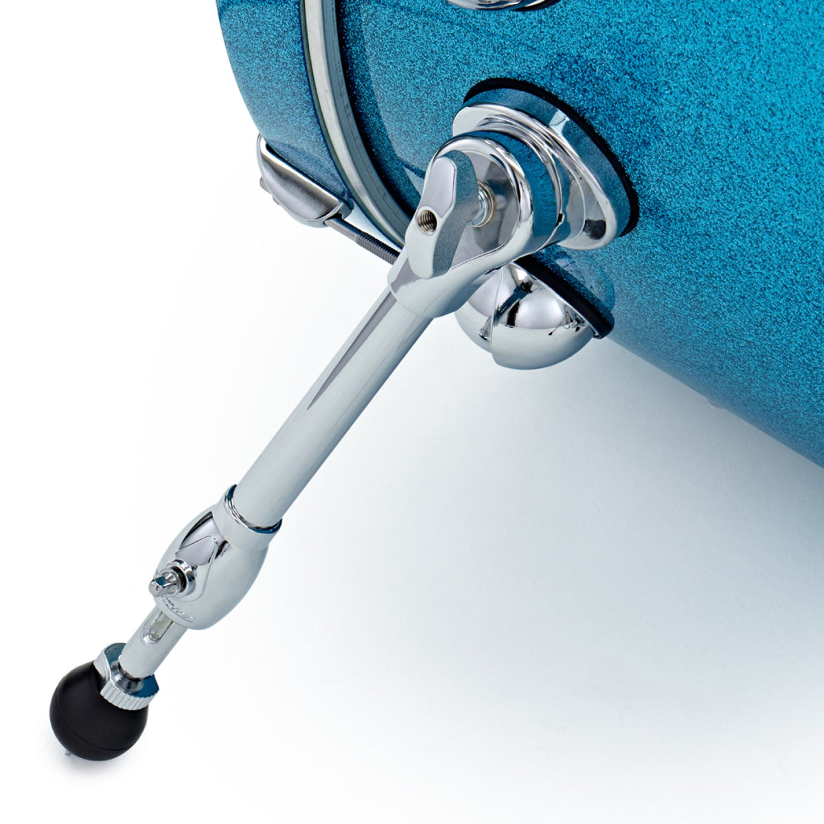 Close-up of the bass drum spur and rubber foot on the Aqua Sparkle Premier Genista Heritage bass drum
