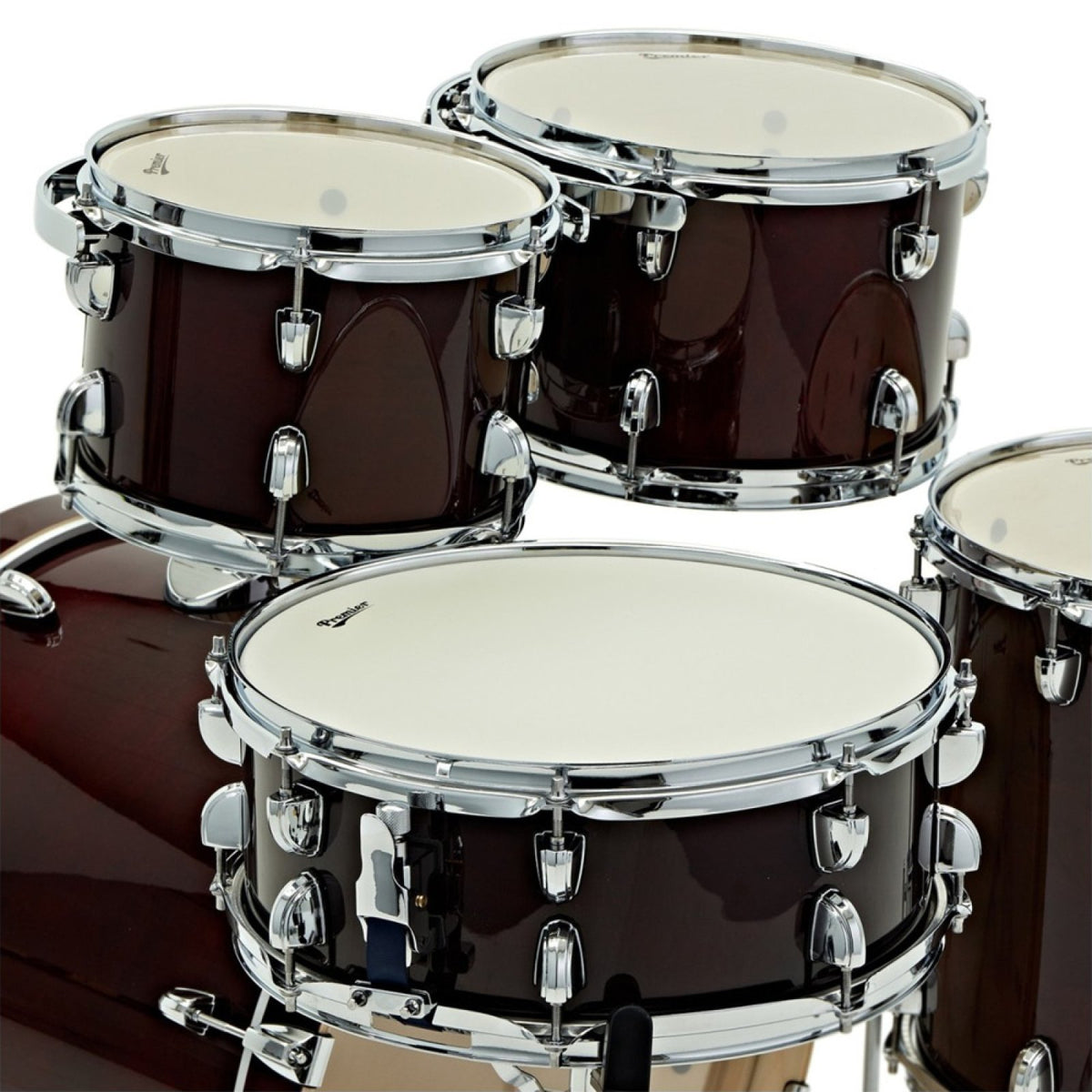Close-up of Premier Artist PAB20-5SPCRL cherry rack toms and snare with chrome hoops and lugs