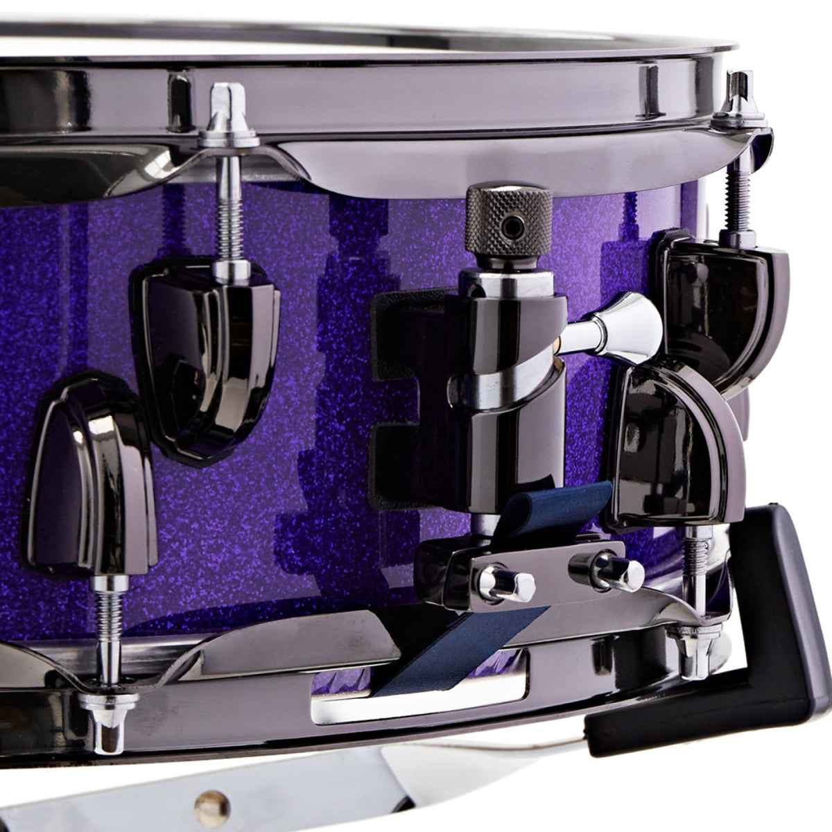 Close-up of a black nickel tension lug and snare strainer on the Premier Little Criminal Purple Rain Sparkle 14 x 4.5 snare drum