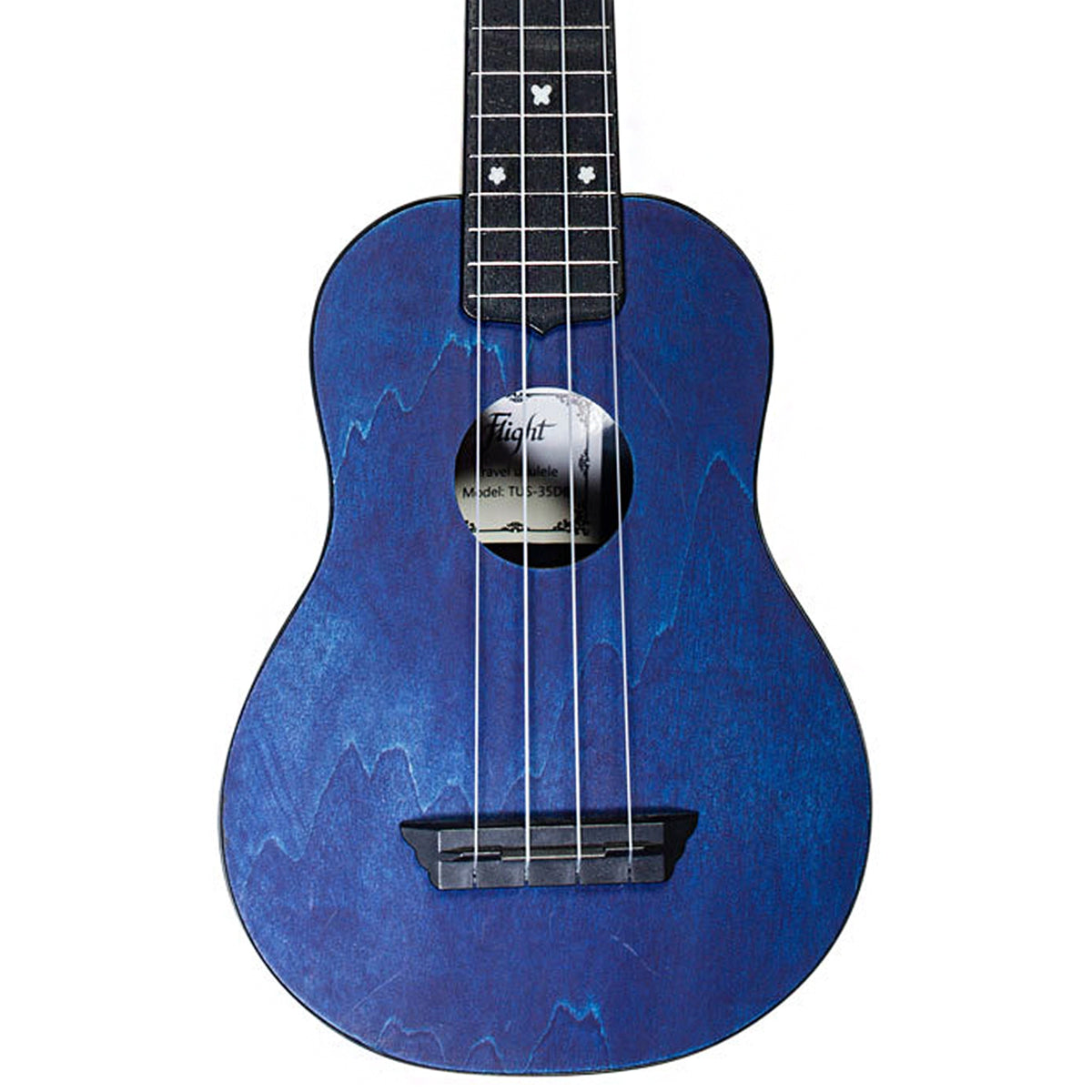 The Flight TUS-35 DB body close-up highlights the dark blue laminate linden top, ABS bridge, and Aquila Nylgut strings.