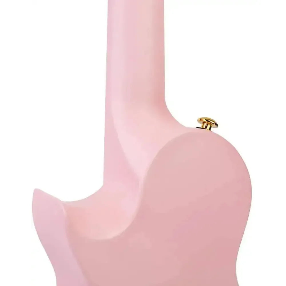 Close-up of a pink guitar or ukulele body and neck at Terry Carter Music Store