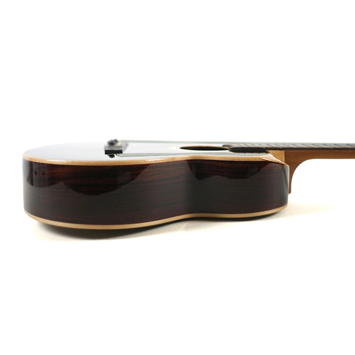 The side view of the Flight 4SB Baritone Ukulele highlights its glossy solid rosewood sides and 2.75-inch body depth.