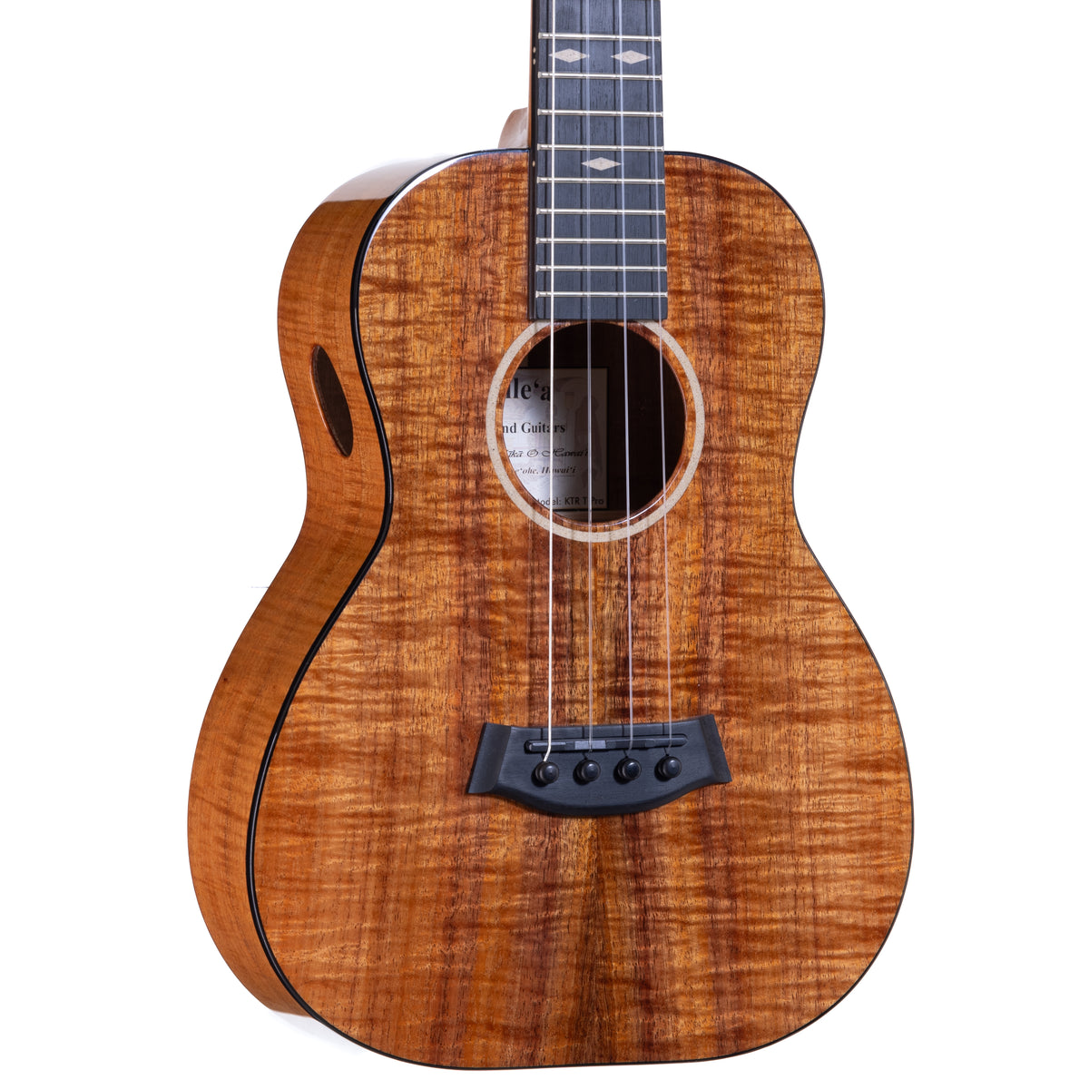 Kanile'a KTR-T Mastergrade Koa Tenor Ukulele, serial 30108: close-up of the figured Mastergrade koa top, bridge and soundhole