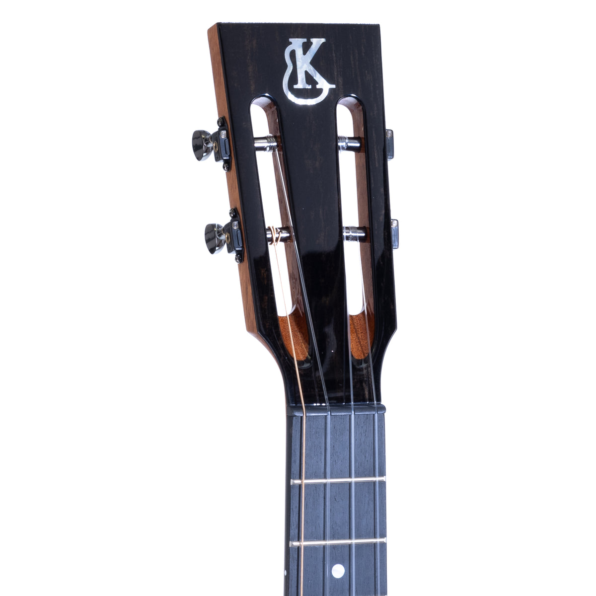 Thin slotted ebony headstock with white mother-of-pearl Kanile'a logo and black Gotoh Stealth tuners on Kanile'a DK-T Pro tenor ukulele, serial 30299