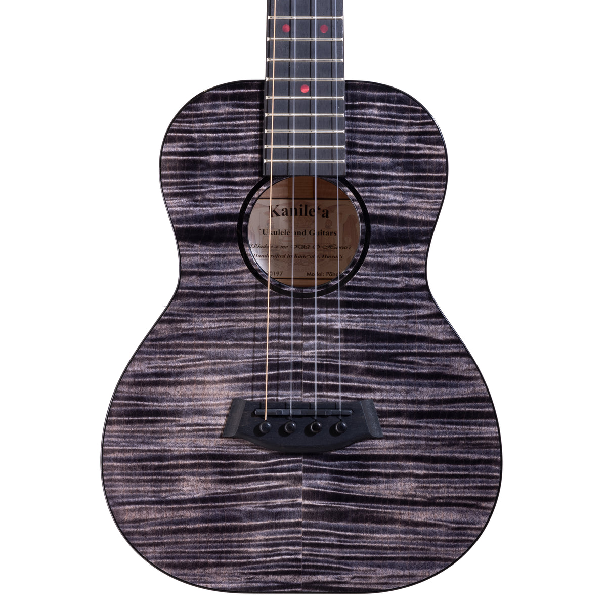 Upper bout of Kanile'a Pohaku Pro tenor ukulele serial 30197 showing the black-stained flamed maple top and soundhole